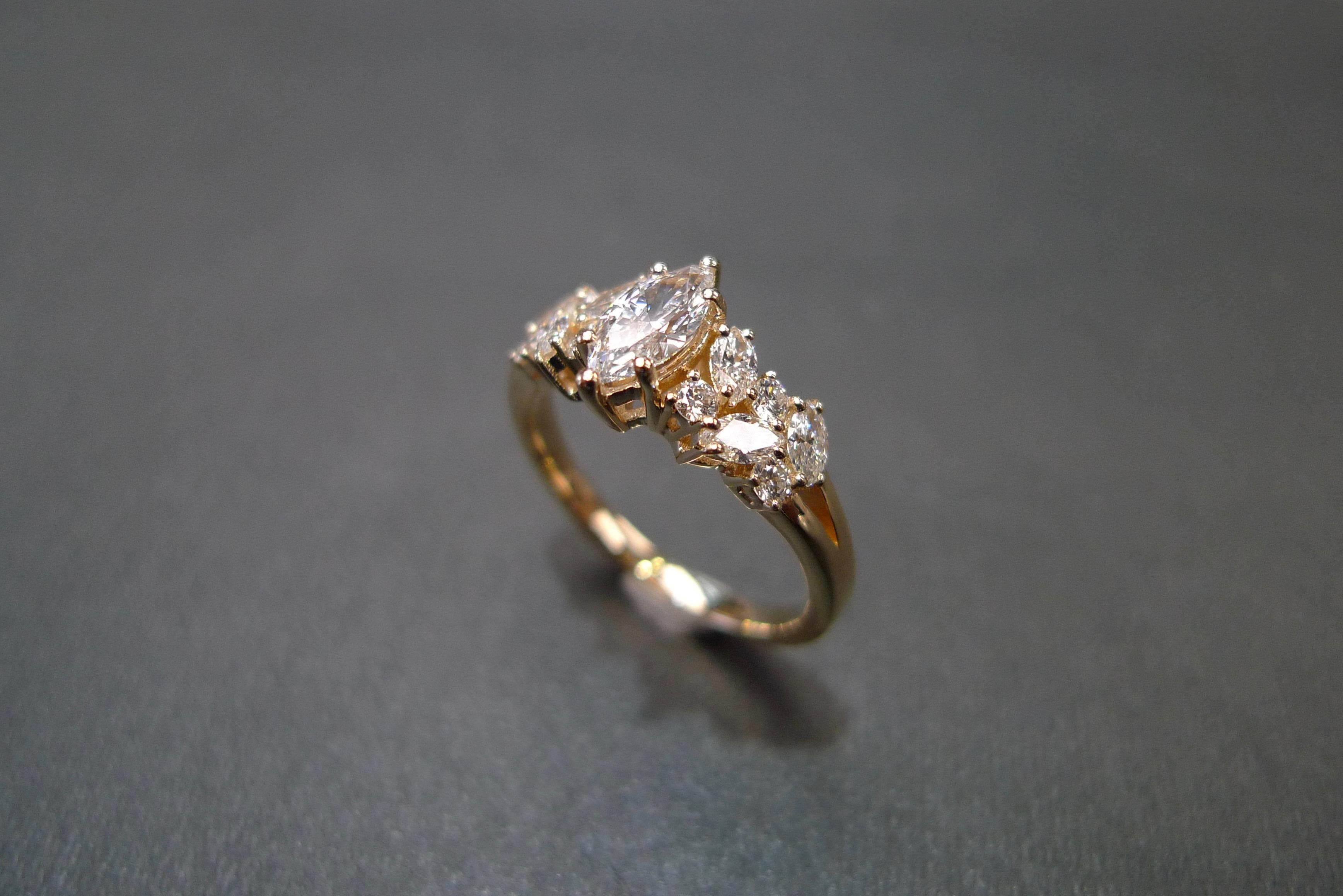 For Sale:  Engagement Ring with Marquise Diamond and Round Brilliant Cut in 18K Rose Gold 10