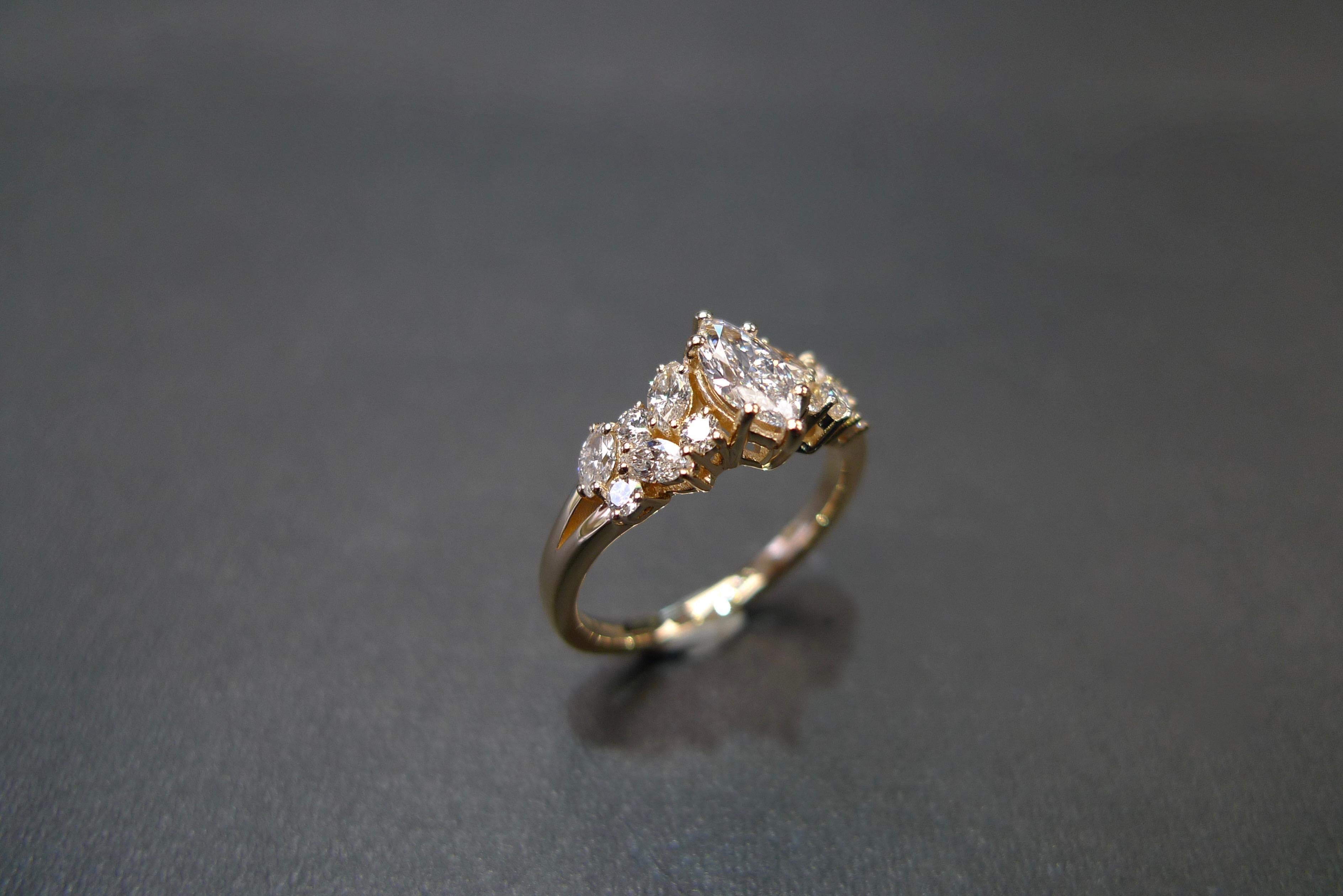 For Sale:  Engagement Ring with Marquise Diamond and Round Brilliant Cut in 18K Rose Gold 11