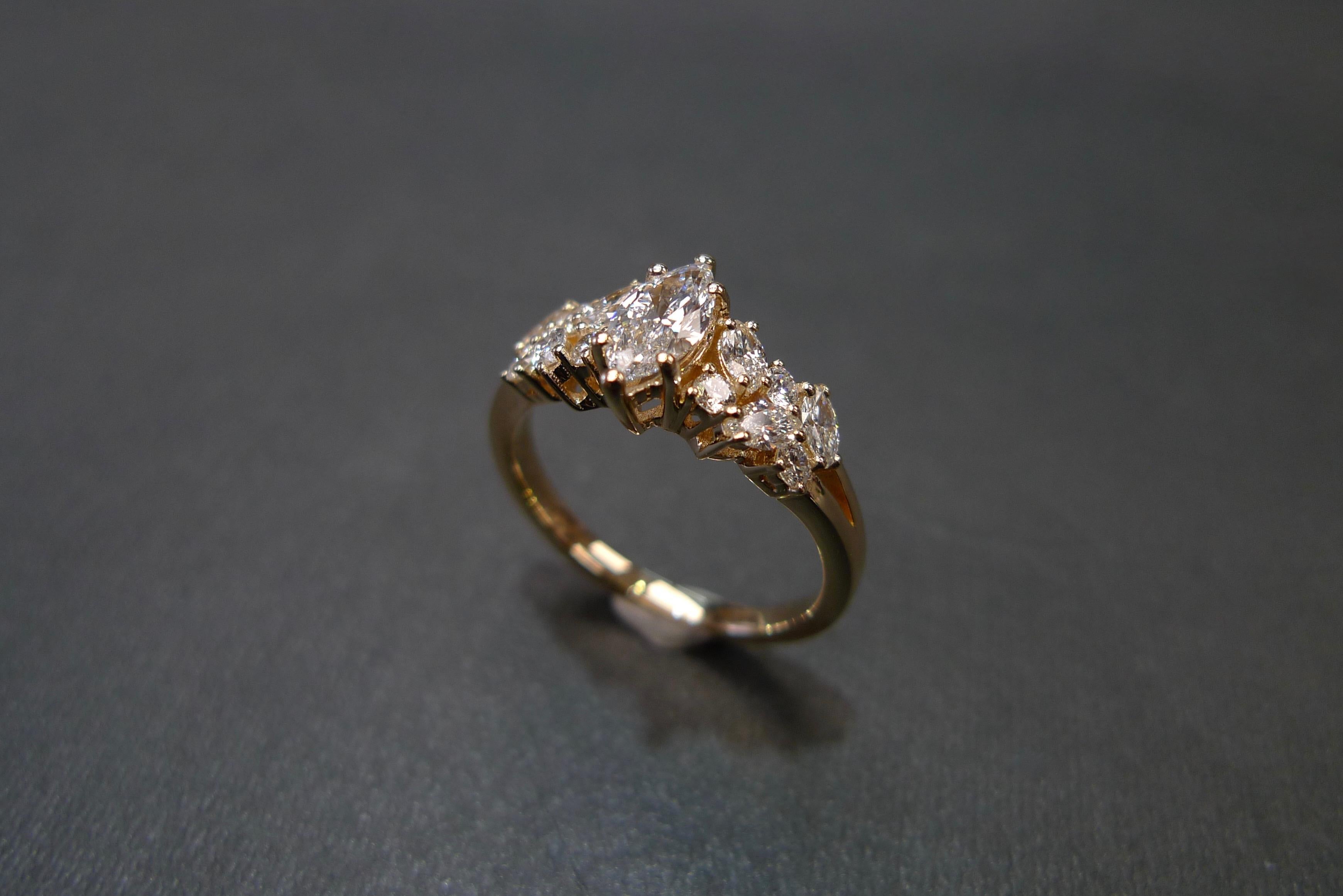 For Sale:  Engagement Ring with Marquise Diamond and Round Brilliant Cut in 18K Rose Gold 2