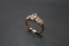 Anello di fidanzamento con diamante marquise e taglio brillante rotondo in oro rosa 18 carati