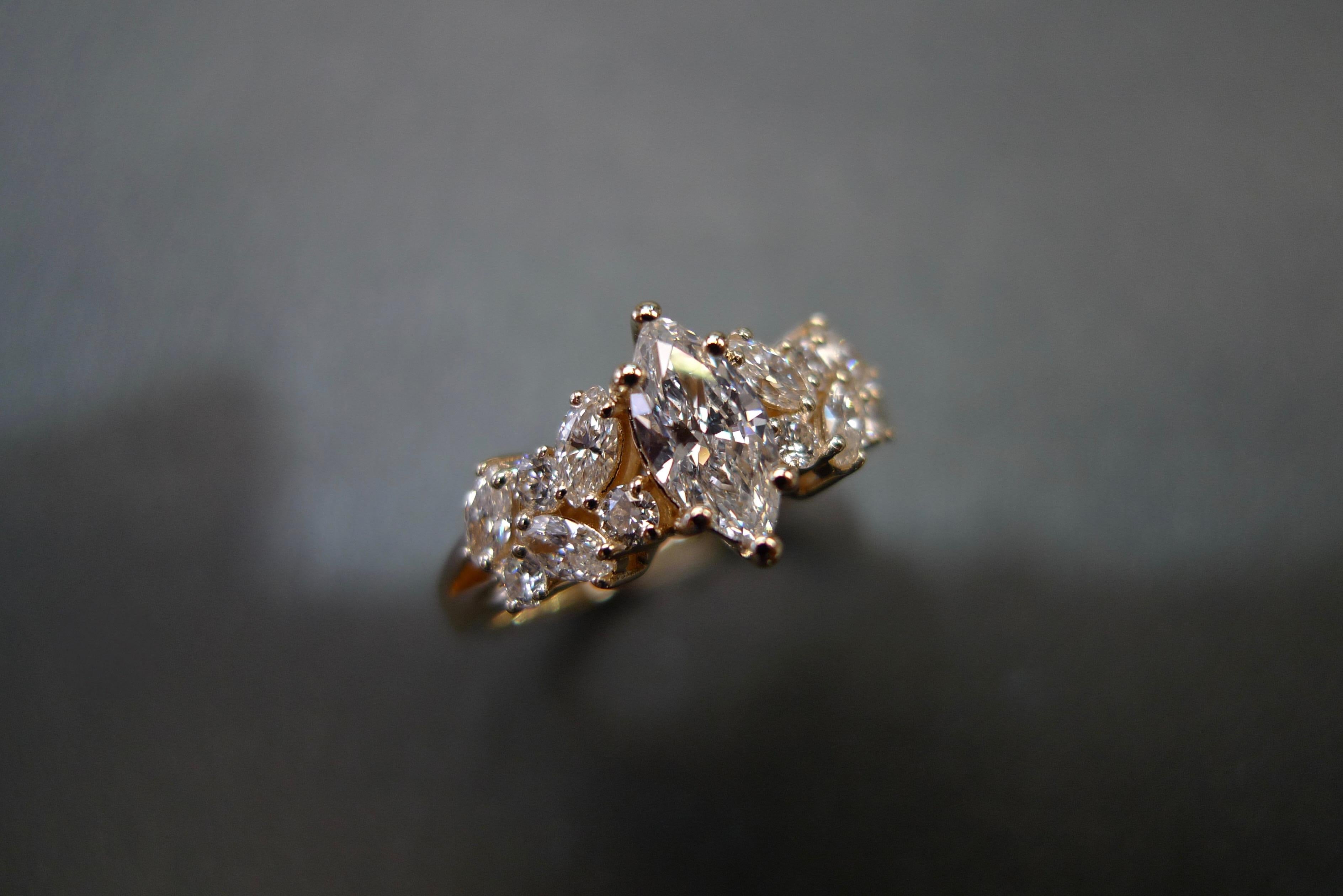 For Sale:  Engagement Ring with Marquise Diamond and Round Brilliant Cut in 18K Rose Gold 13