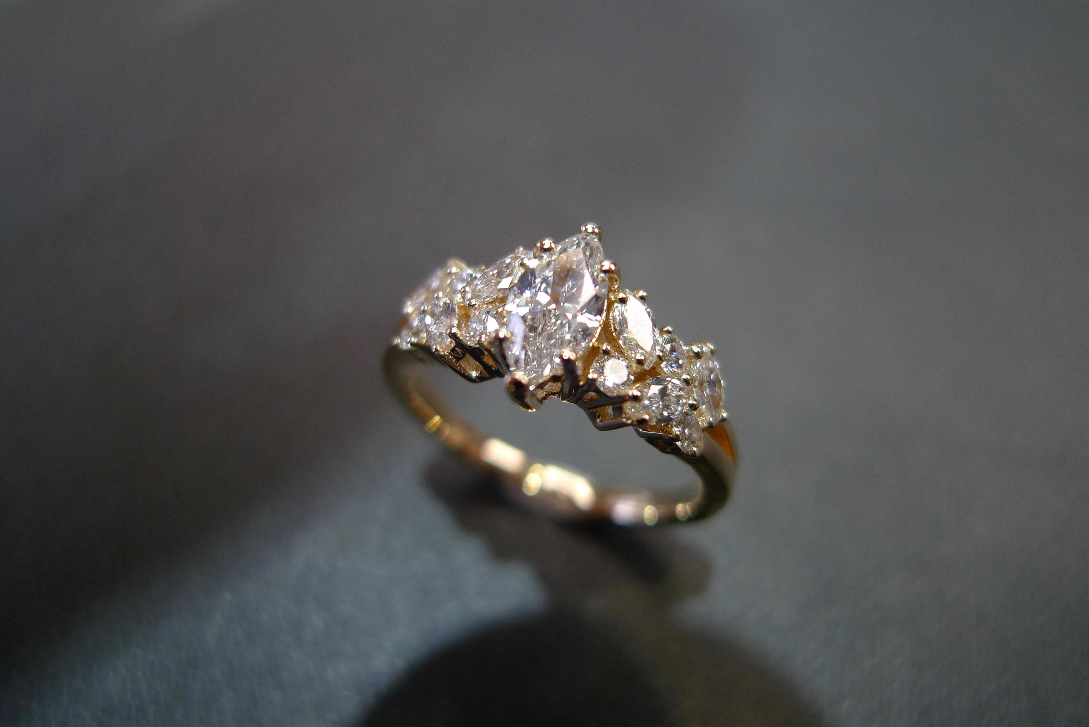 For Sale:  Engagement Ring with Marquise Diamond and Round Brilliant Cut in 18K Rose Gold 7