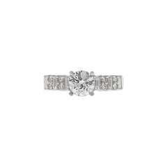 Engagement Ring with Round Brilliant Cut Diamonds and Baguettes