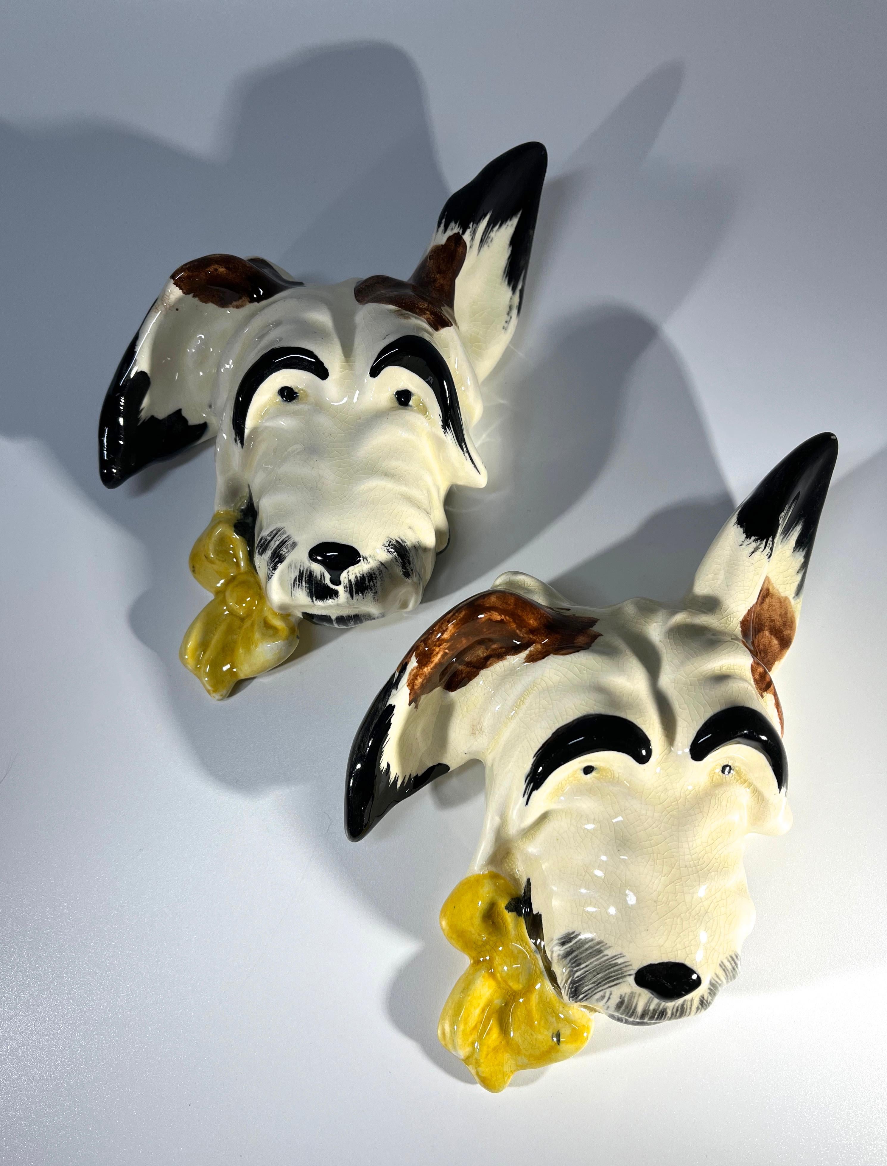 Engaging Pair Of Hand Painted English Terrier Wall Dogs, Mid 20th Century In Good Condition For Sale In Rothley, Leicestershire