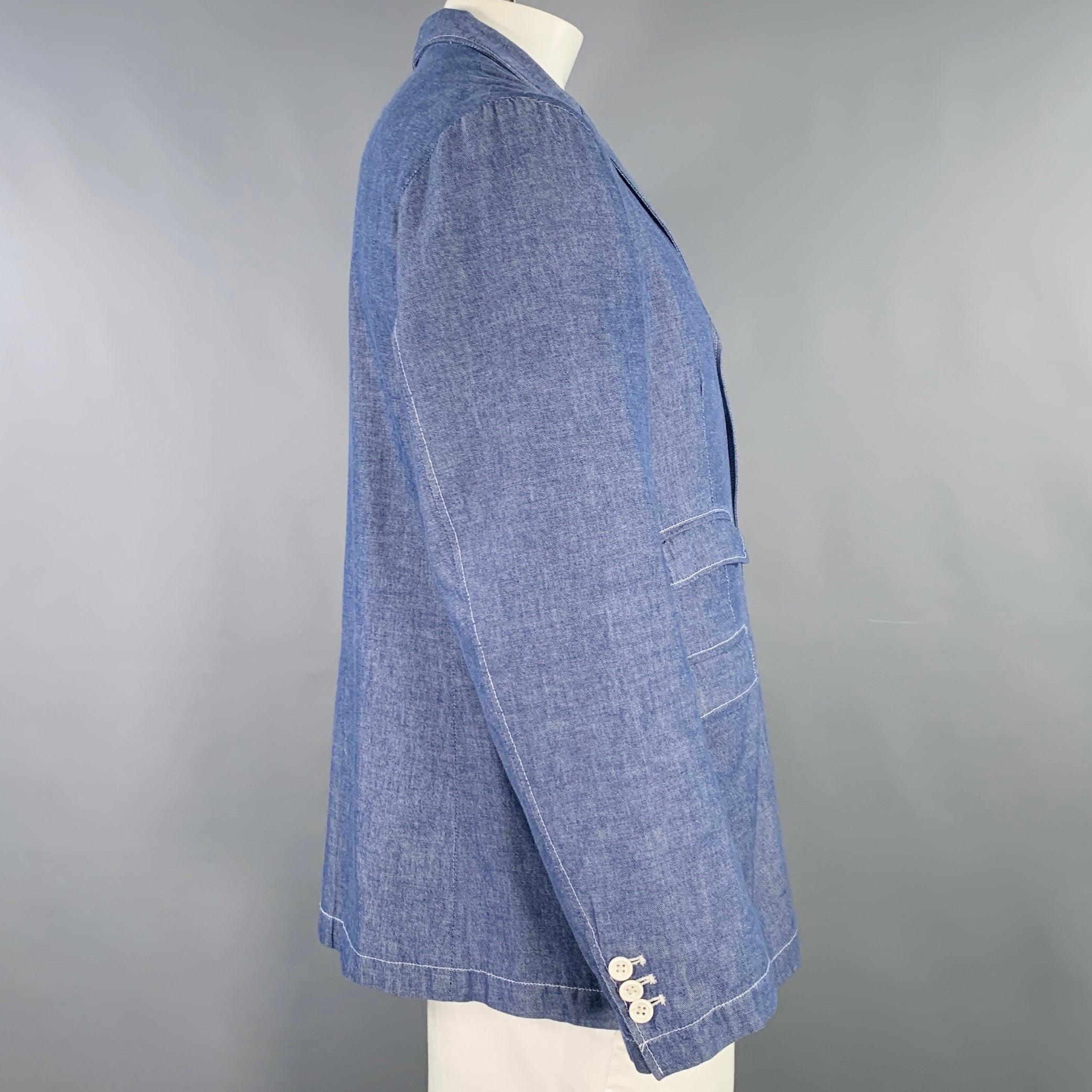 ENGINEERED GARMENTS jacket in a blue cotton featuring a textured design, notch lapel, and three button closure. Made in USA.
Excellent Pre-Owned Condition. 

Marked:   XL 

Measurements: 
 
Shoulder: 19 inches Chest: 45 inches Sleeve: 24.5 inches