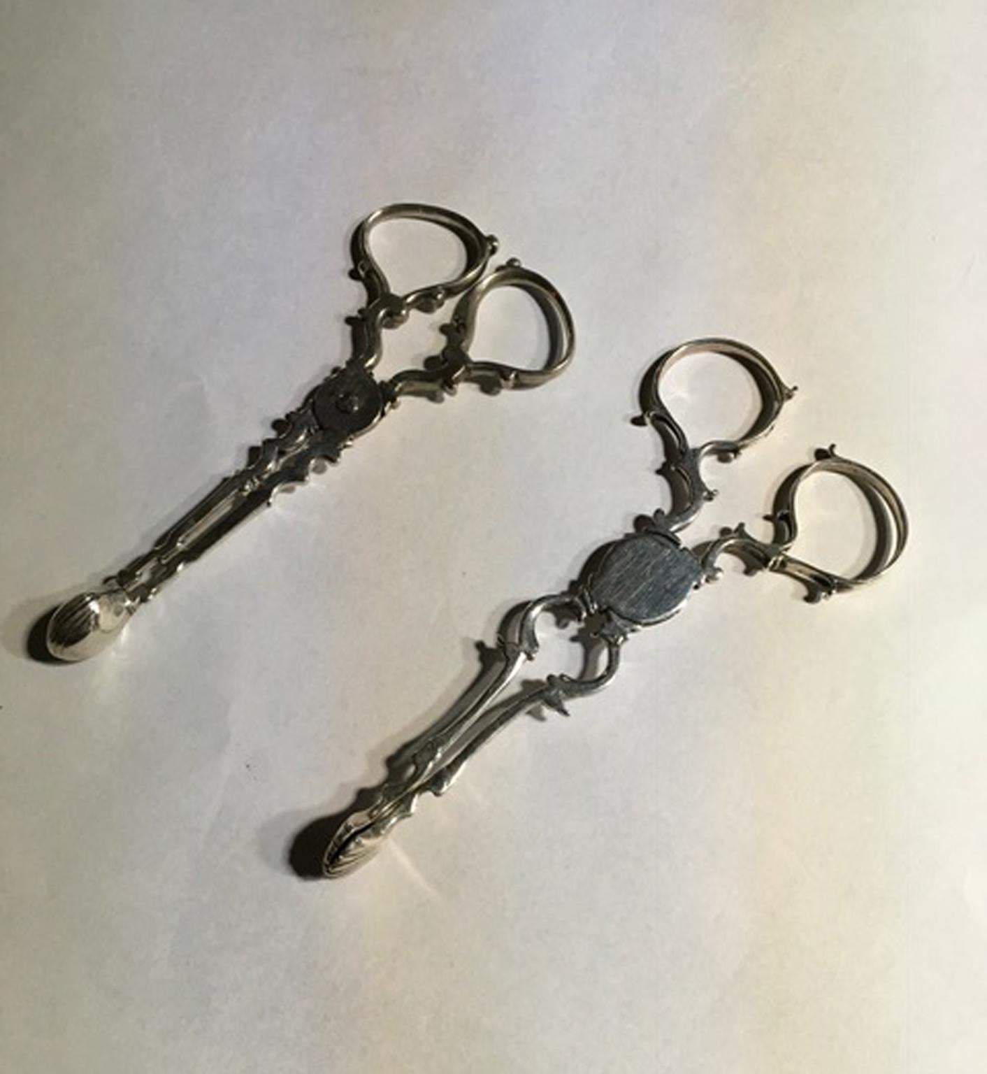 Hand-Crafted London  18th Century Pair of Regency Sterling Silver Sugar Nips For Sale