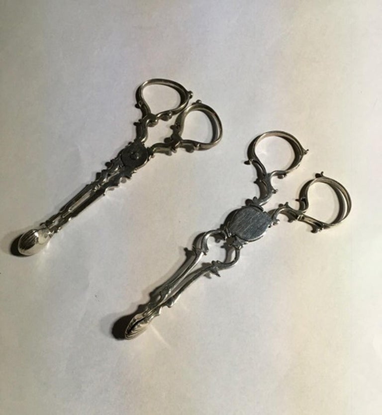 London 18th Century Pair of Regency Sterling Silver Sugar Nips For Sale