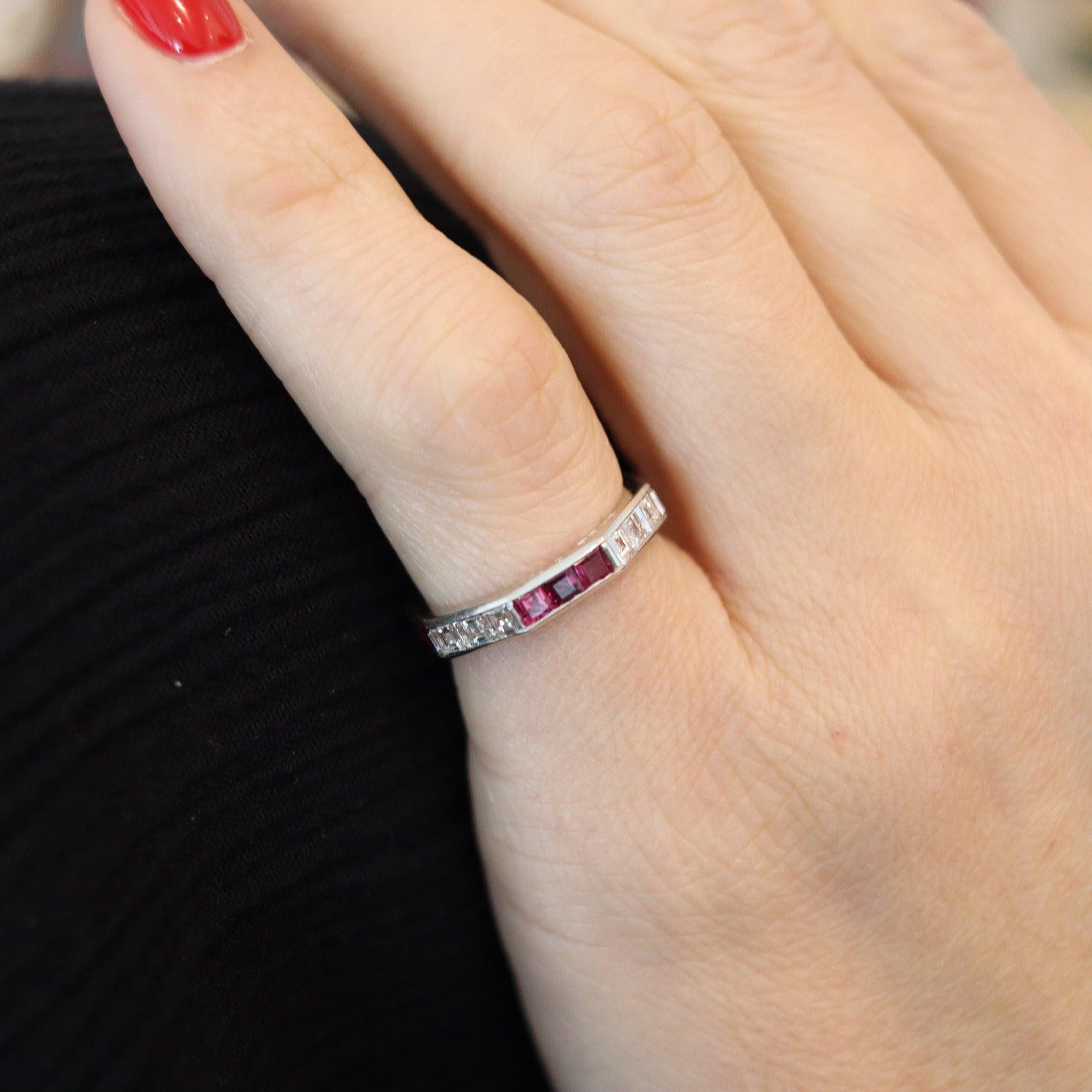 An octagonal eternity ring with rubies & diamonds.

This is a stunning octagonal shaped eternity ring, created in London England. The ring has been masterfully crafted with eight sides in solid white gold of 18 karats with high polished finish. It