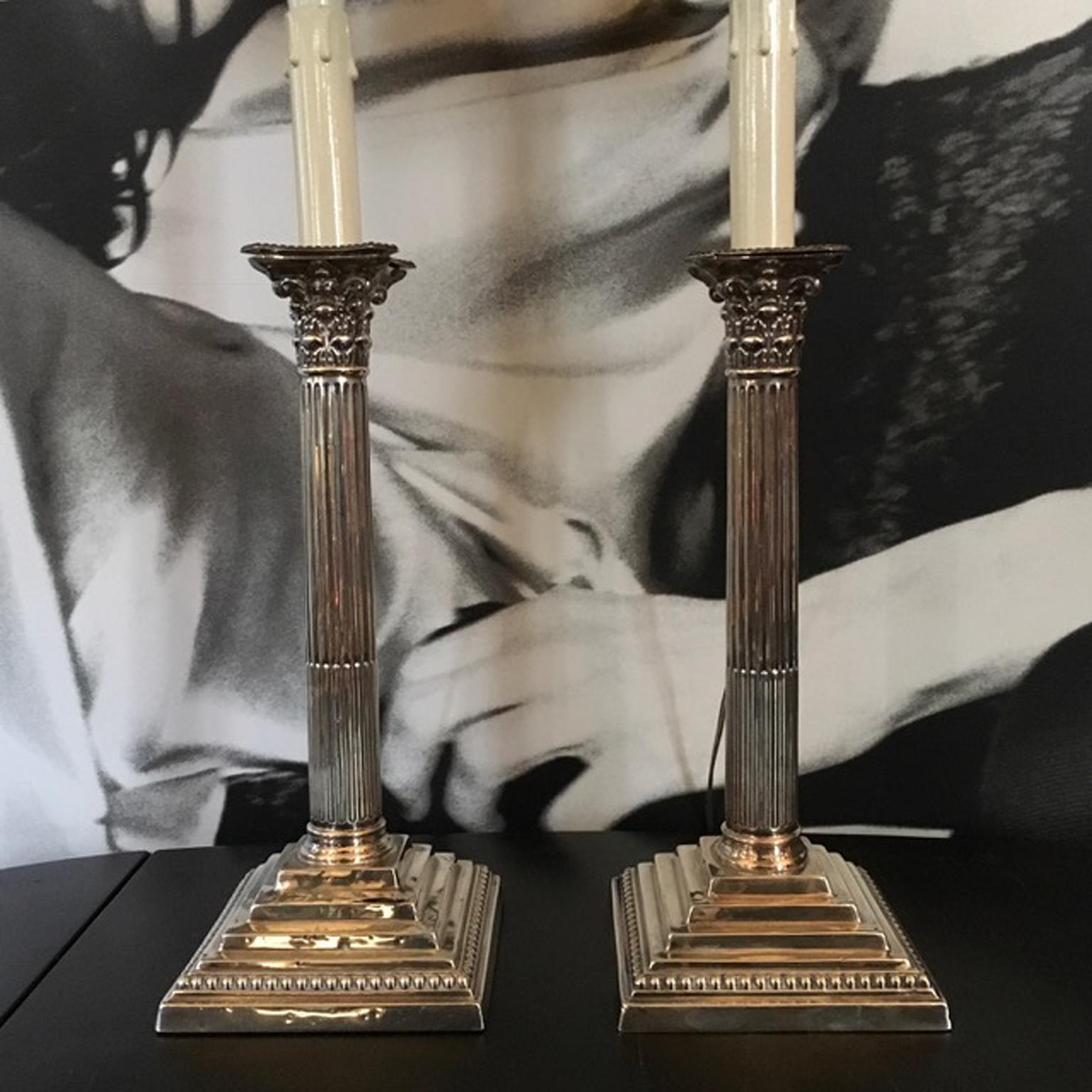 England pair of neoclassical style silver candleholders table lamps, circa 1890.

This fine pair of neoclassical silver candleholder, is electrified and it becomes an elegant couple of table lamps. For their slim dimensions are perfect to be put