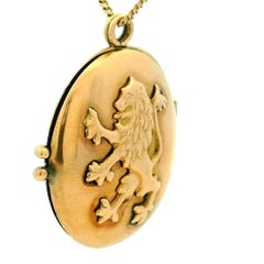 English 14K Gold Heraldic Lion Rampant Oval Photo Locket Pendant, Circa 1940