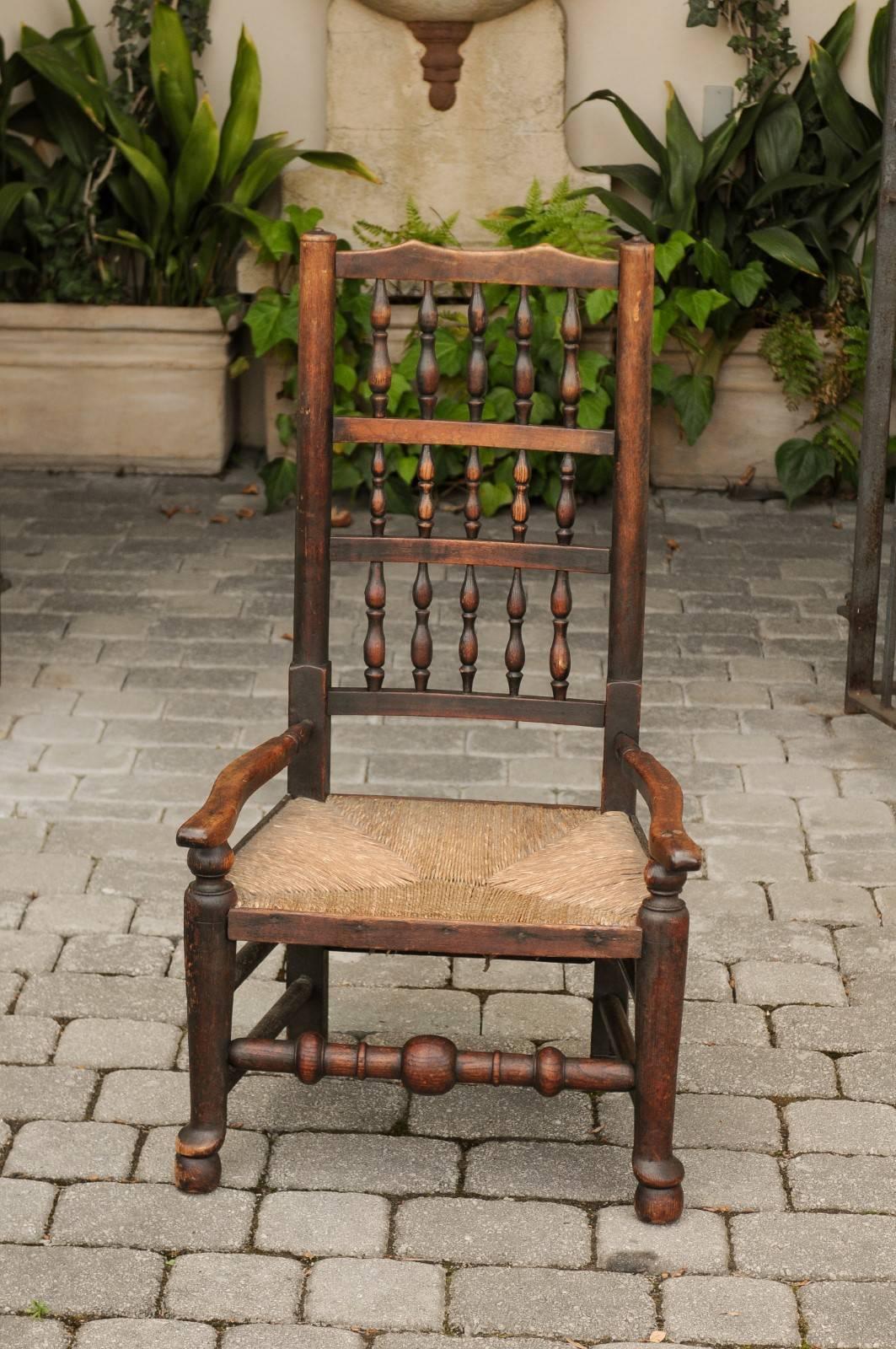 English 1780s Oak William and Mary Style Open Arm Youth Chair with Rush Seat In Good Condition For Sale In Atlanta, GA
