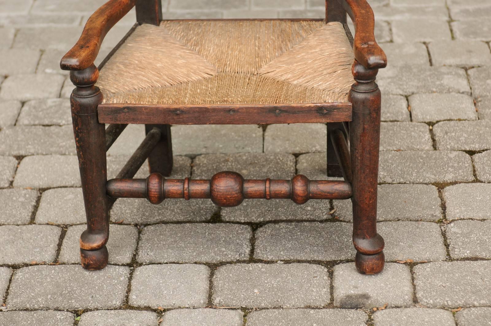18th Century English 1780s Oak William and Mary Style Open Arm Youth Chair with Rush Seat For Sale