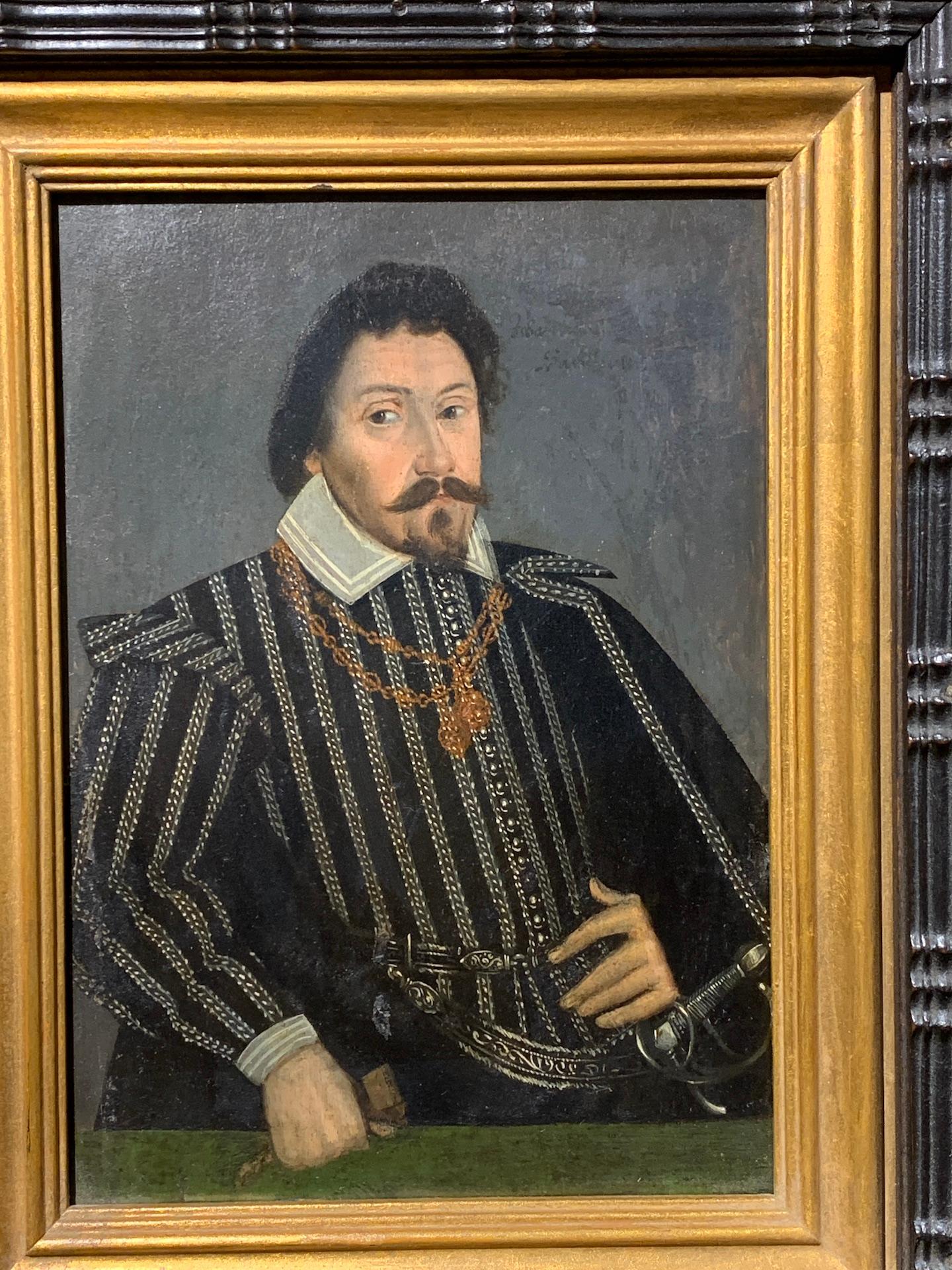 Early 17th century Portrait of a Nobleman, with sword, on a wood panel - Painting by English 17th century