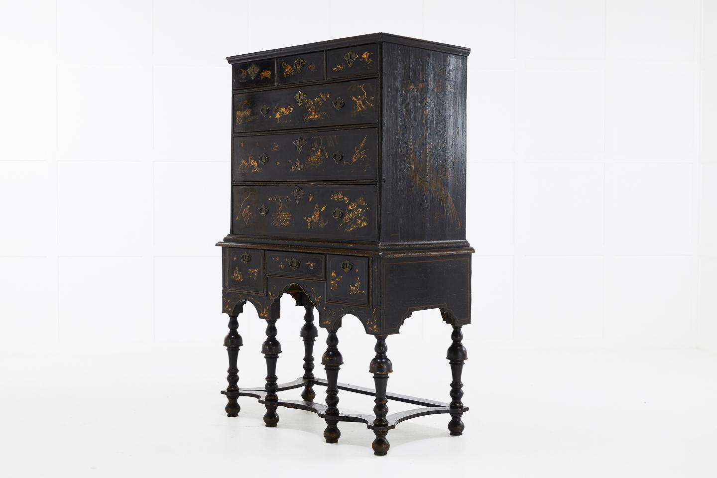 English 17th century William and Mary Japanned chest on stand. Decorated with charmingly worn gilt chinoiserie figures and birds. The legs have been replaced sometime during the 19th century.