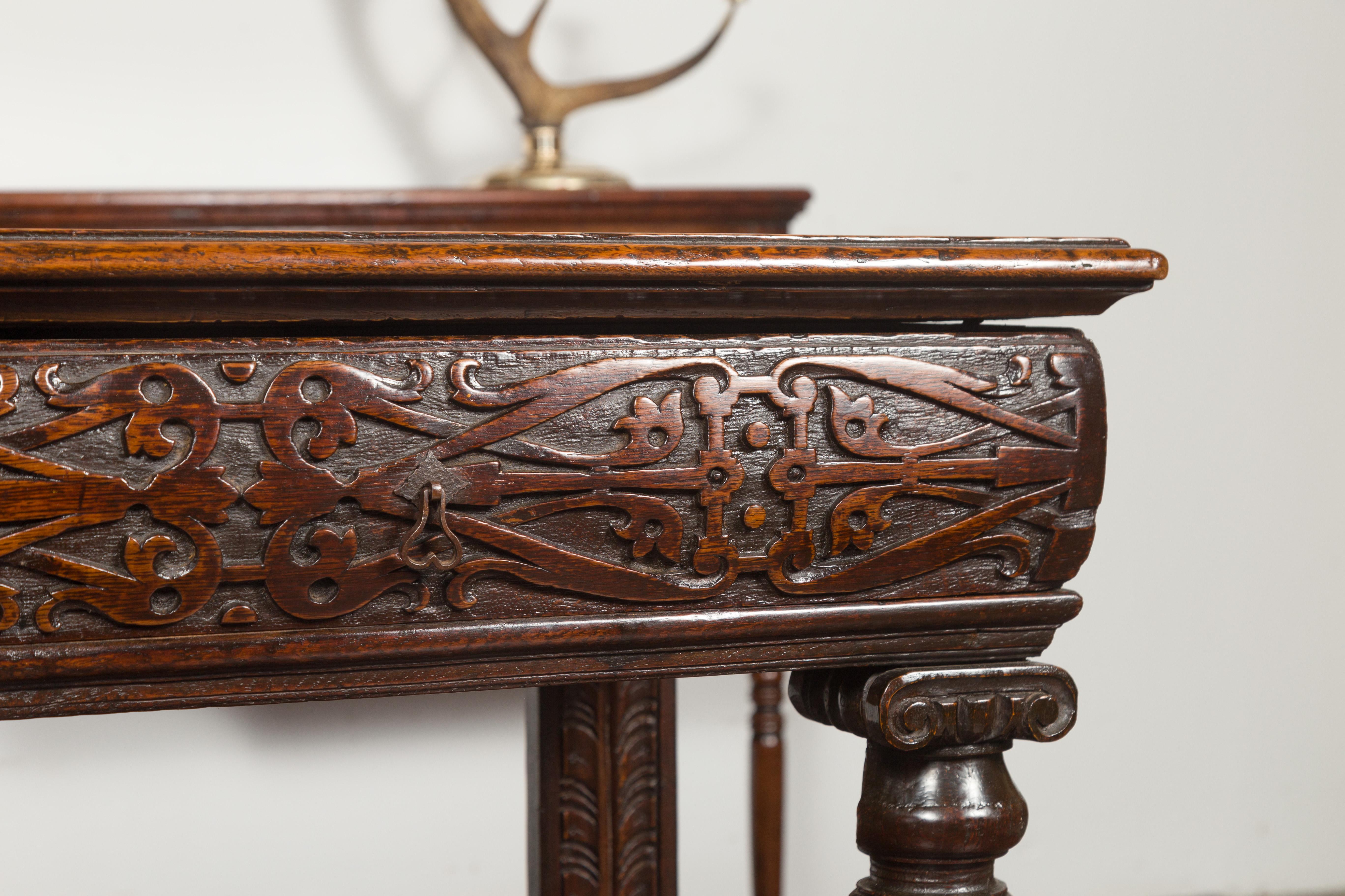English 1800s George III Oak Console Table with Carved Drawer and Ionic Capitals For Sale 3