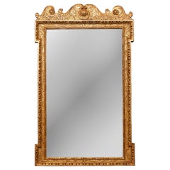 English 1800s Georgian Period Carved Giltwood Mirror with Shell and Foliage