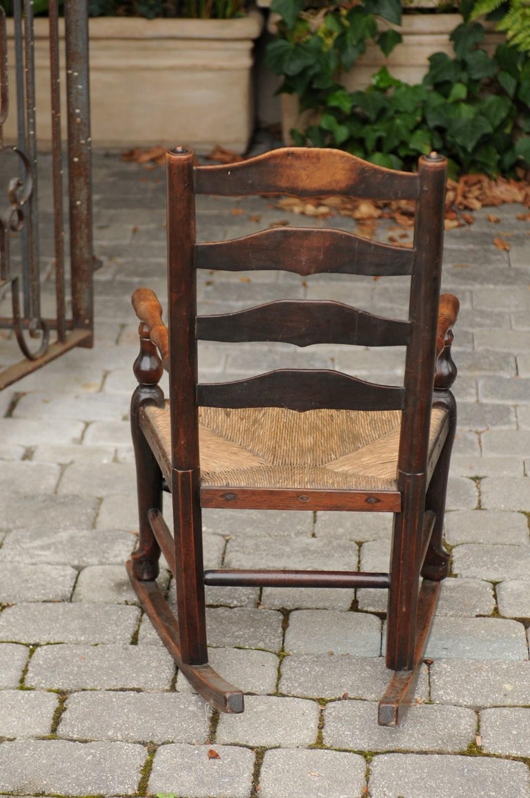 English 1800s Period Plum Wood Child's Rocking Chair with Rush