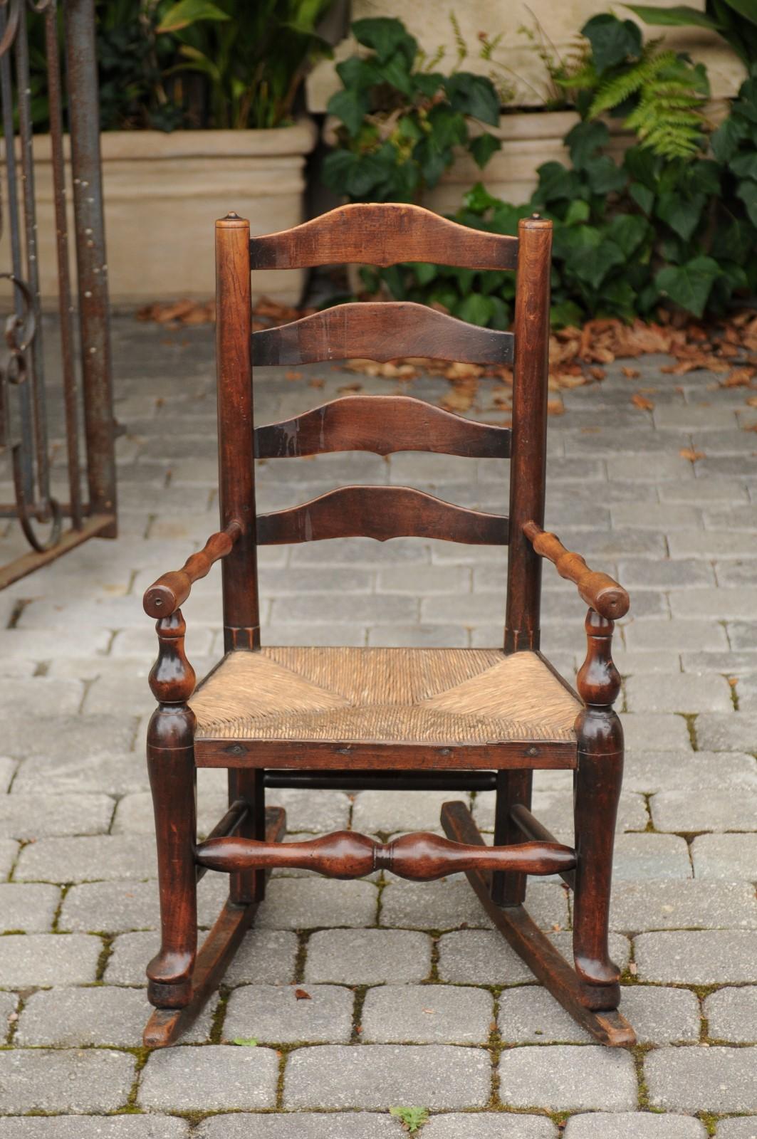 English 1800s Georgian Period Plum Wood Child's Rocking Chair with Rush Seat In Good Condition For Sale In Atlanta, GA