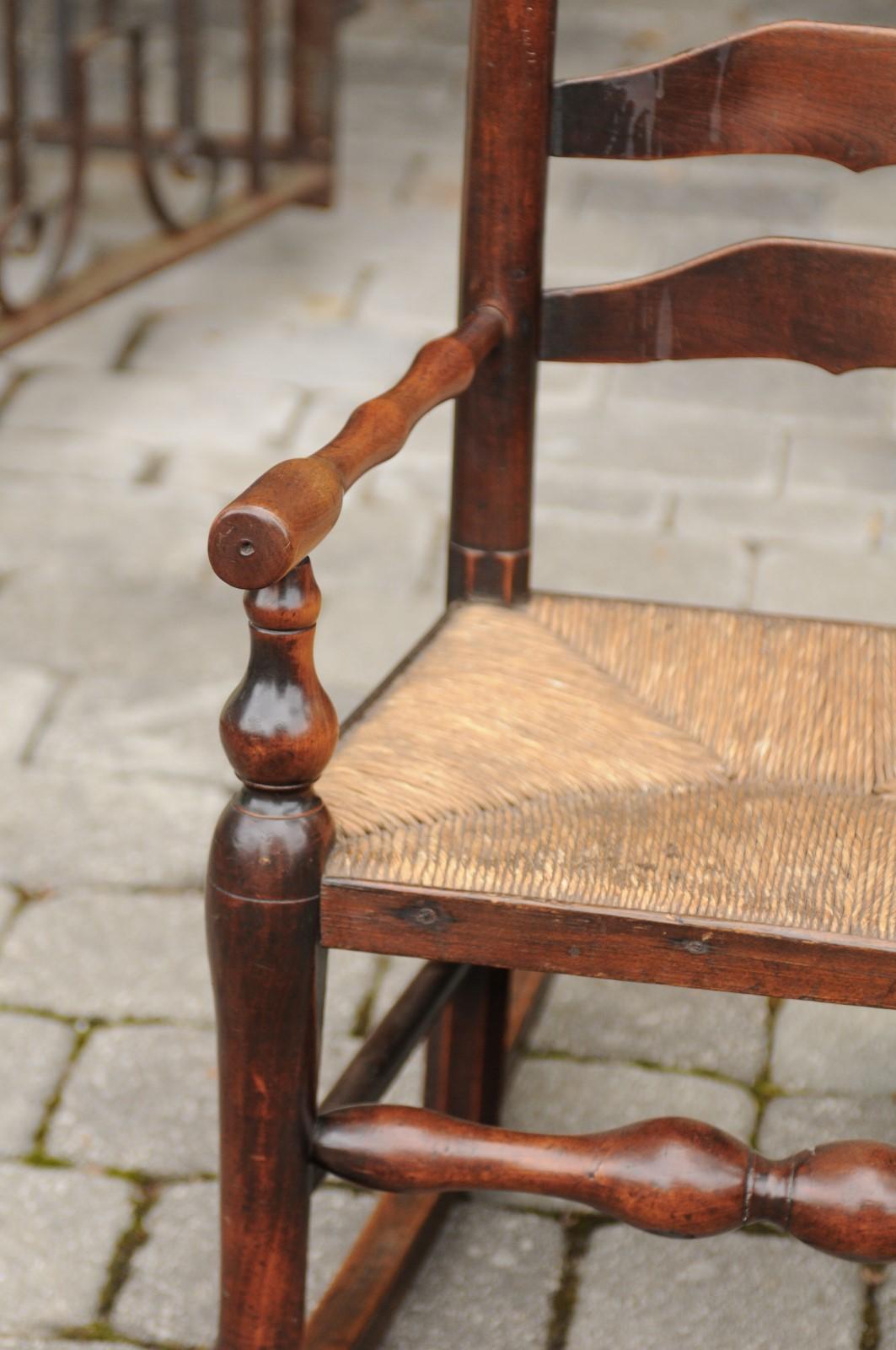 English 1800s Georgian Period Plum Wood Child's Rocking Chair with Rush Seat For Sale 2