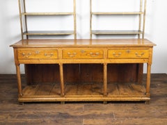 English 1820s Georgian Dresser Base with Three Drawers and Pot Board Shelf