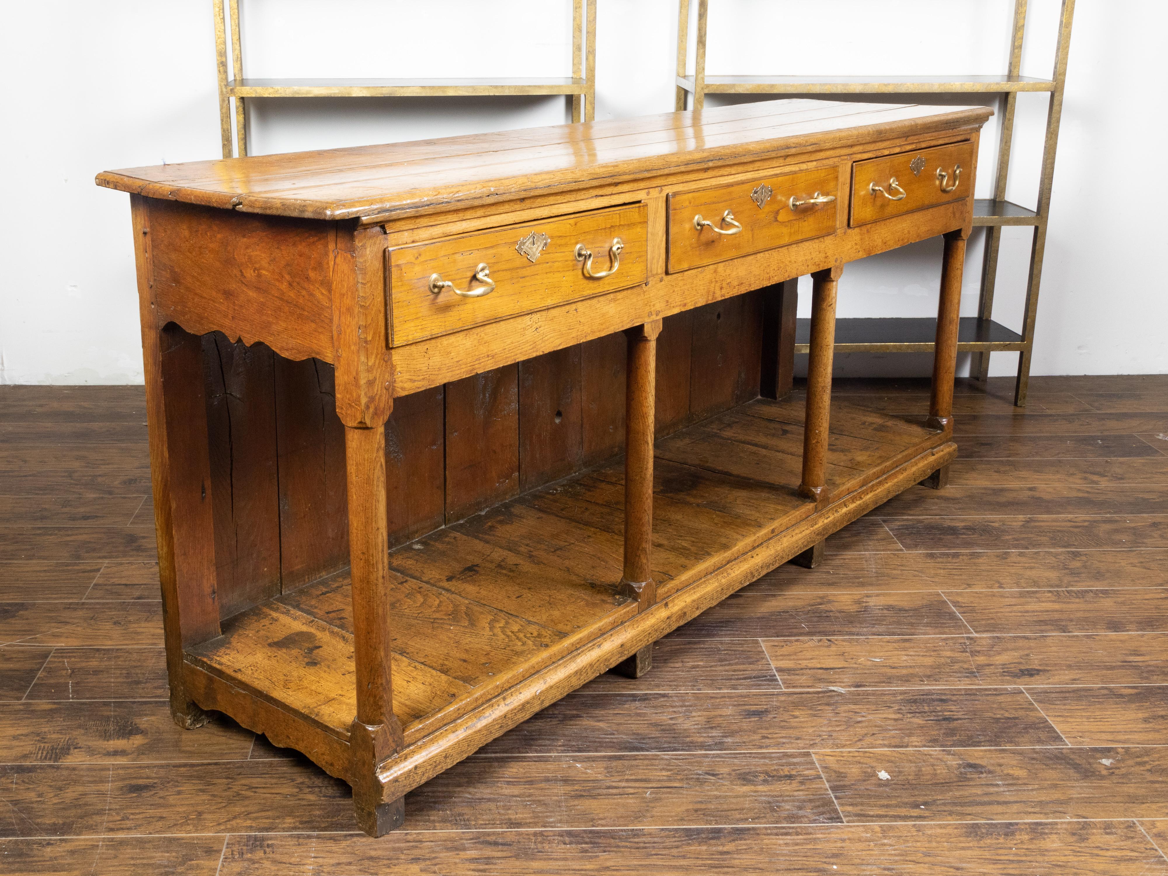 English 1820s Georgian Dresser Base with Three Drawers and Pot Board Shelf 1