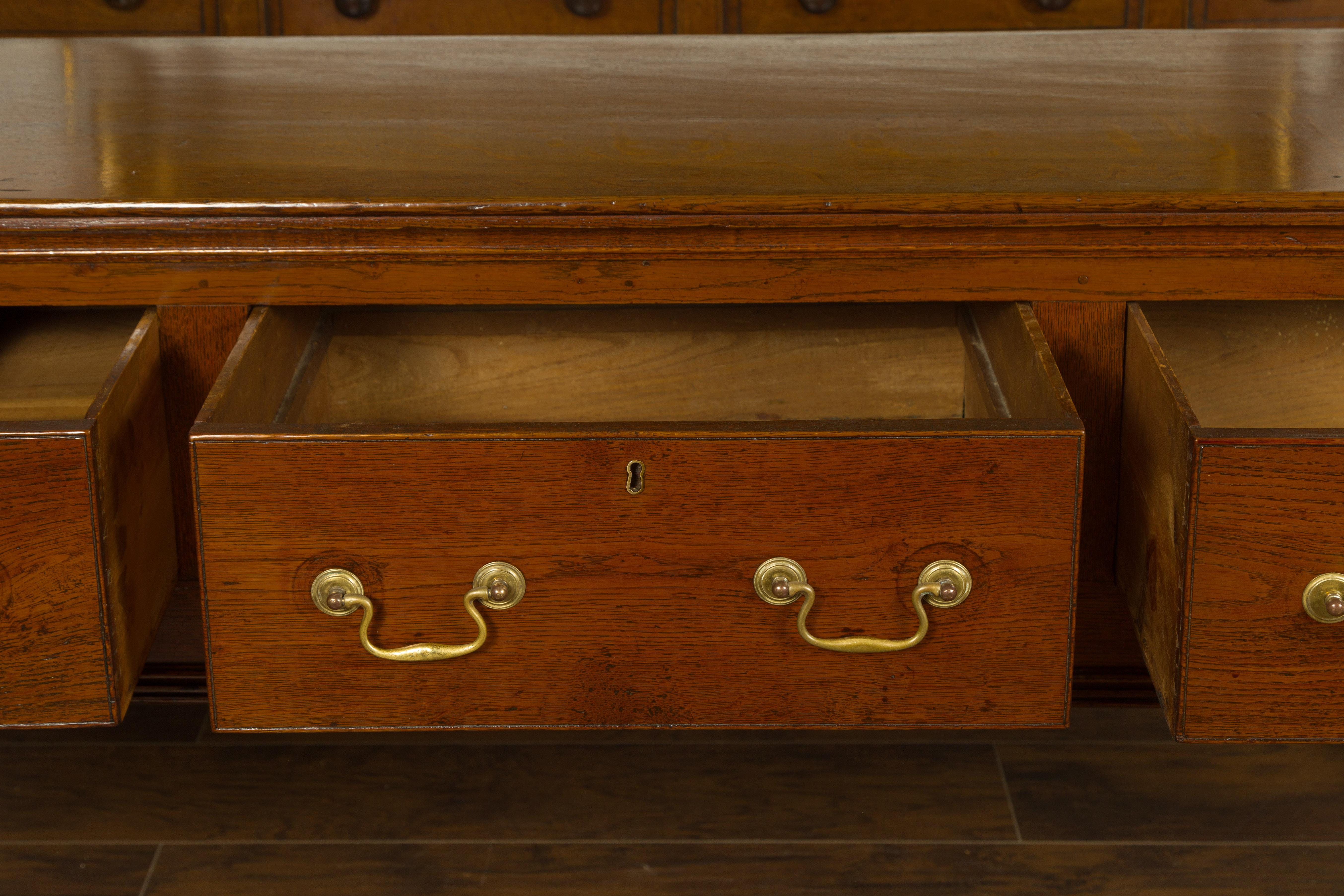 English 1820s Georgian Period Oak Dresser Base with Three Drawers and Pad Feet 5