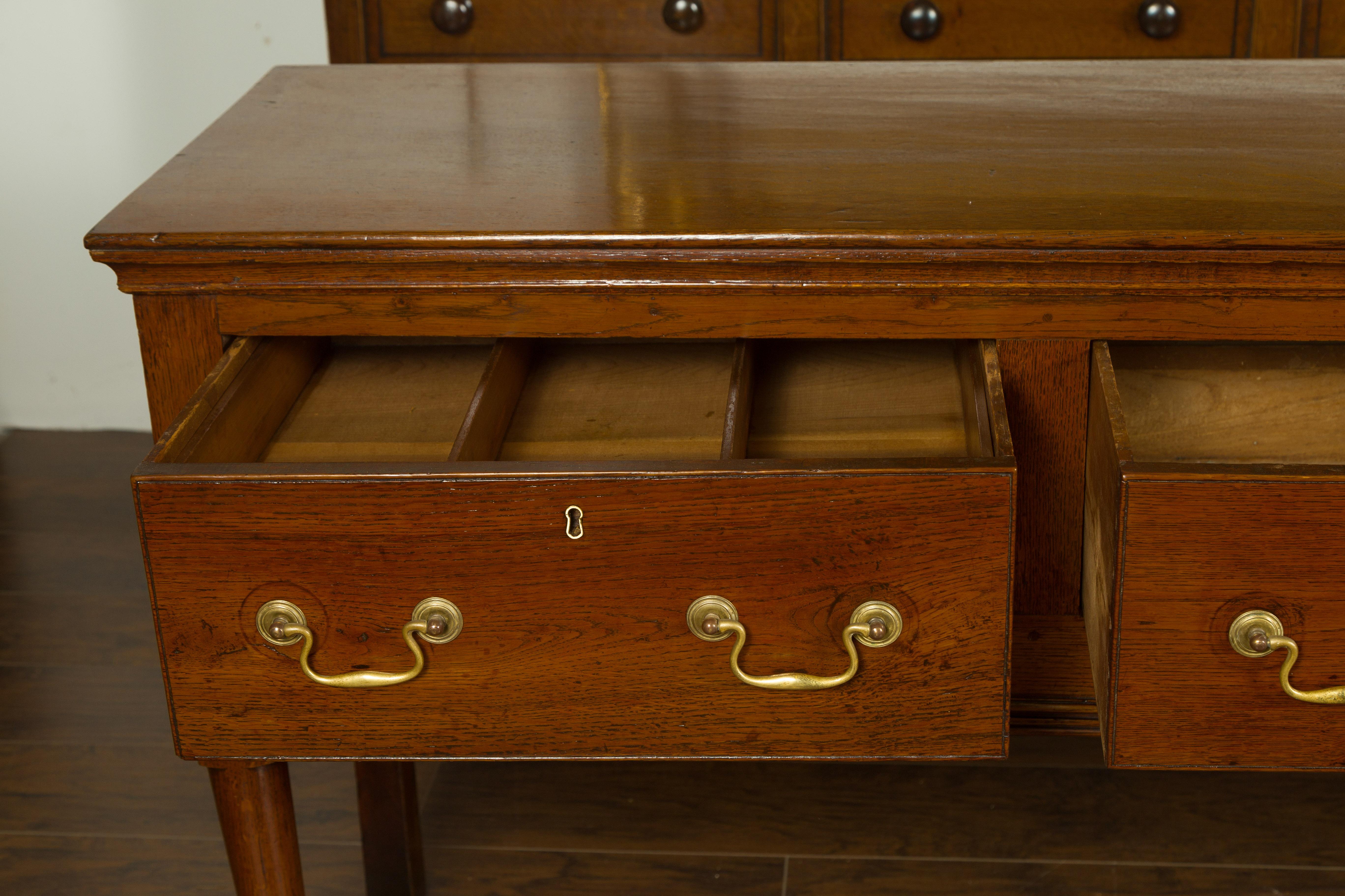 English 1820s Georgian Period Oak Dresser Base with Three Drawers and Pad Feet 4