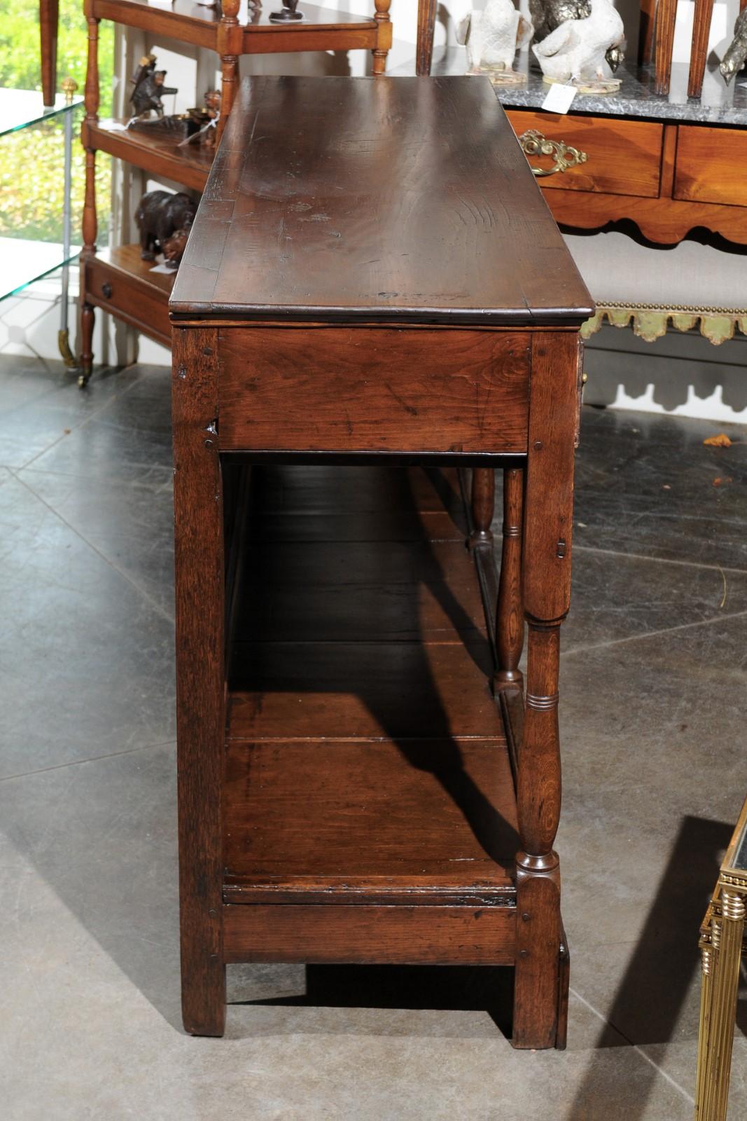 English 1820s Georgian Walnut Dresser Base with Balusters and Arched Apron 6