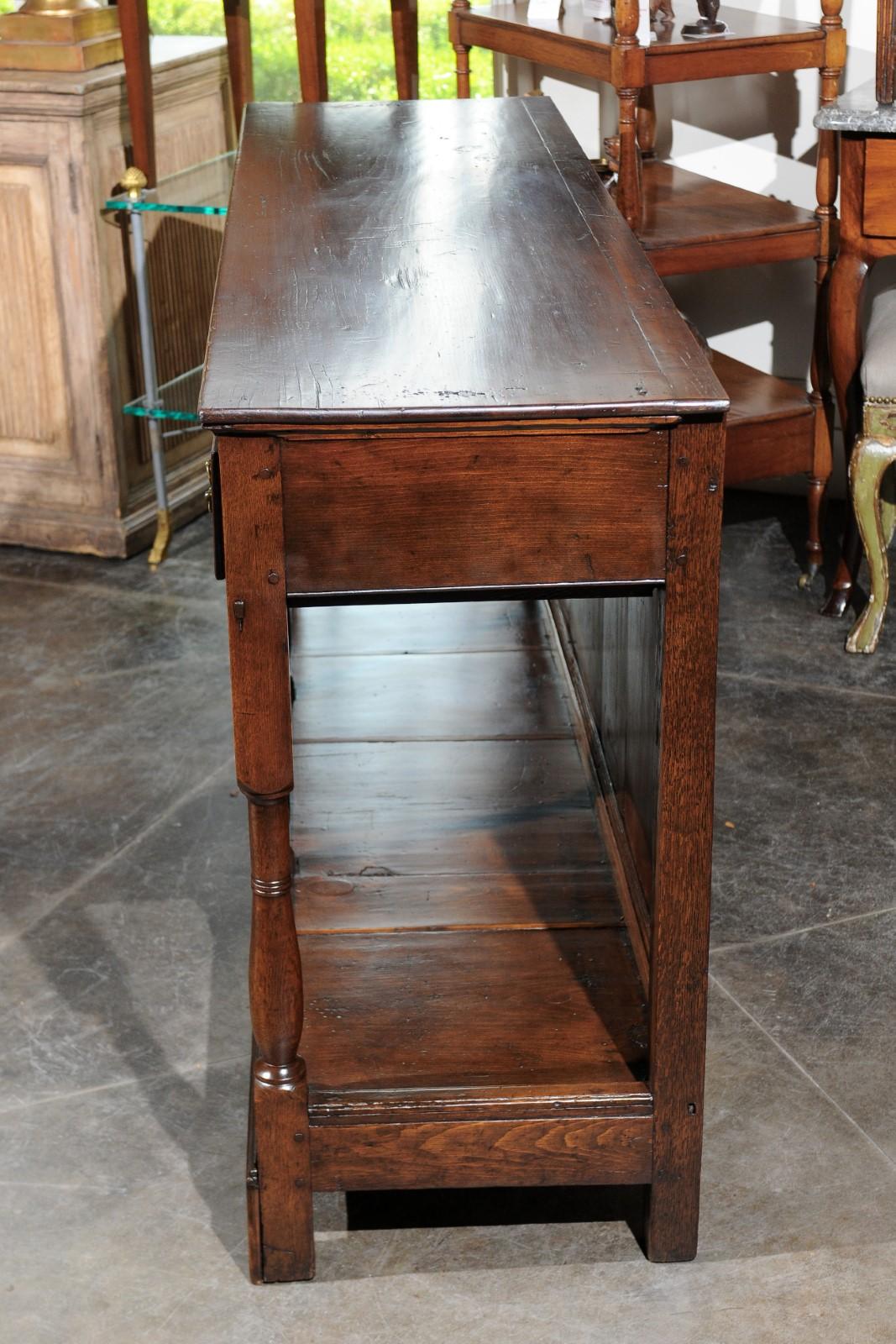 English 1820s Georgian Walnut Dresser Base with Balusters and Arched Apron 9