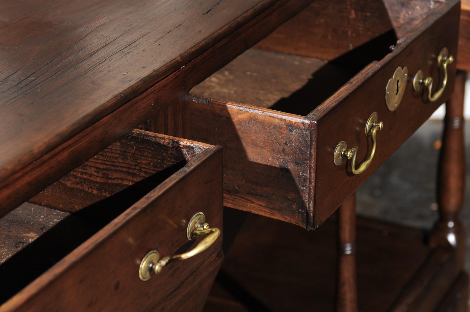 English 1820s Georgian Walnut Dresser Base with Balusters and Arched Apron 4