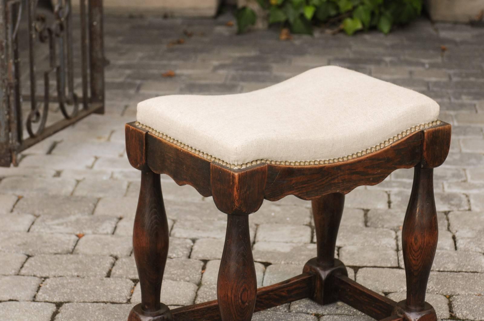 Turned English 1820s Oak Saddle Seat Stool with Baluster Legs and New Upholstery