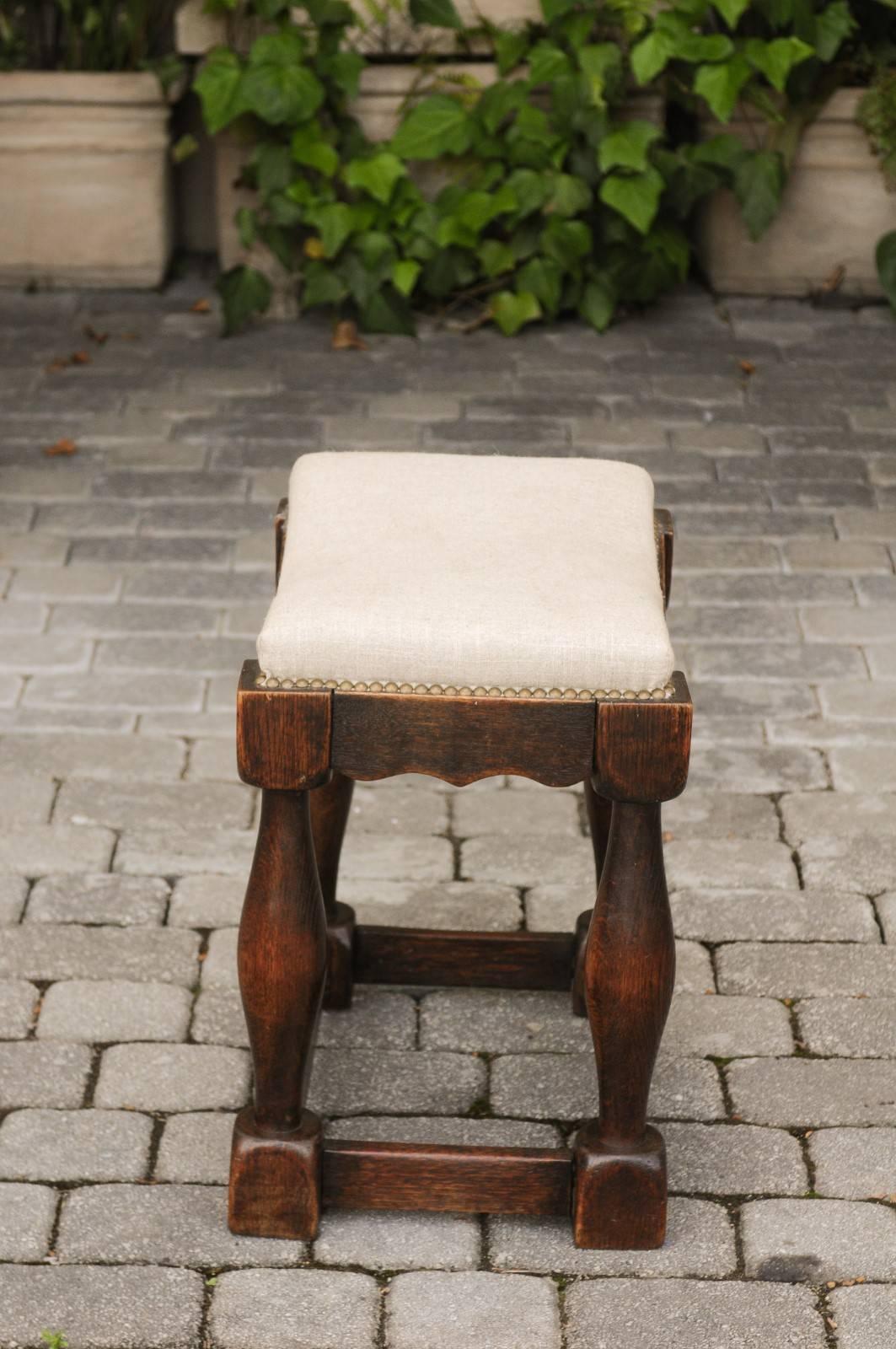 19th Century English 1820s Oak Saddle Seat Stool with Baluster Legs and New Upholstery