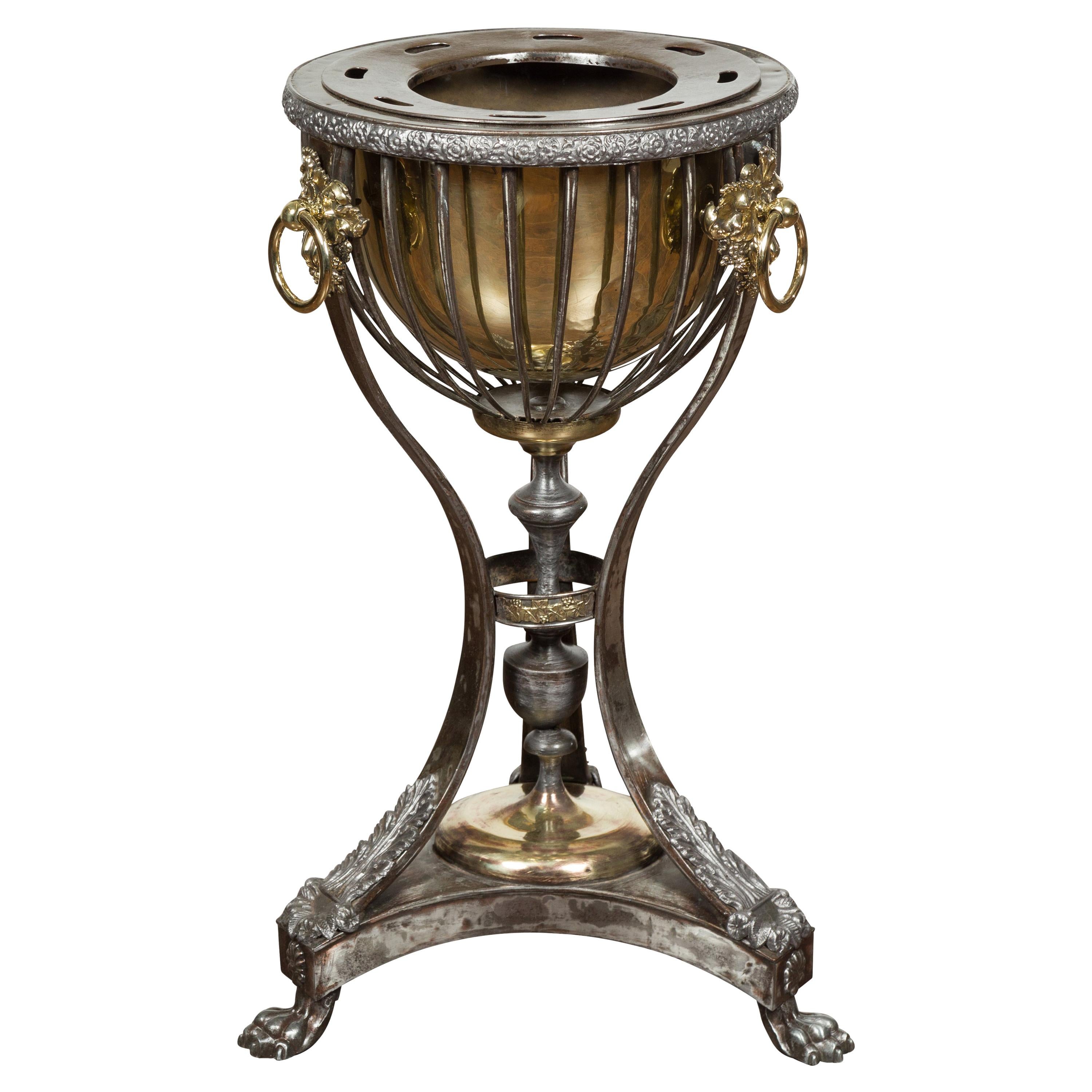 English 1820s Steel and Brass Tripod Wine Cooler with Foliage and Fruit Motifs For Sale