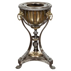 English 1820s Steel and Brass Tripod Wine Cooler with Foliage and Fruit Motifs