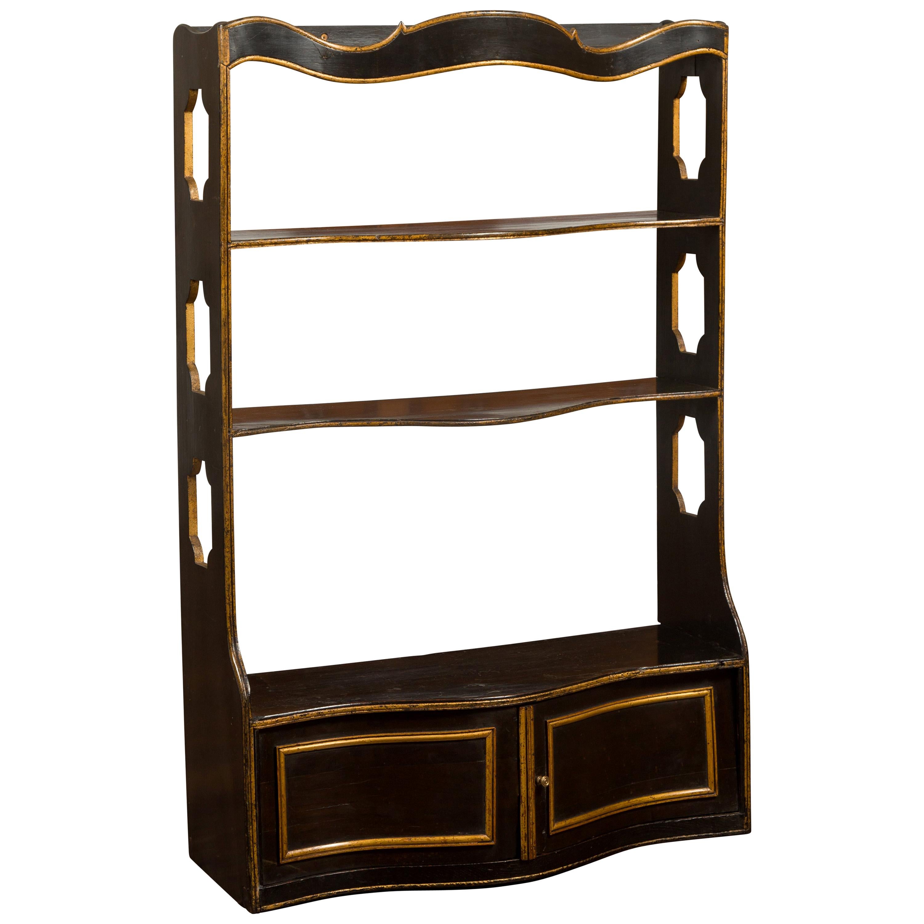 English 1830s Regency Black and Gold Serpentine Front Wall Hanging Shelf