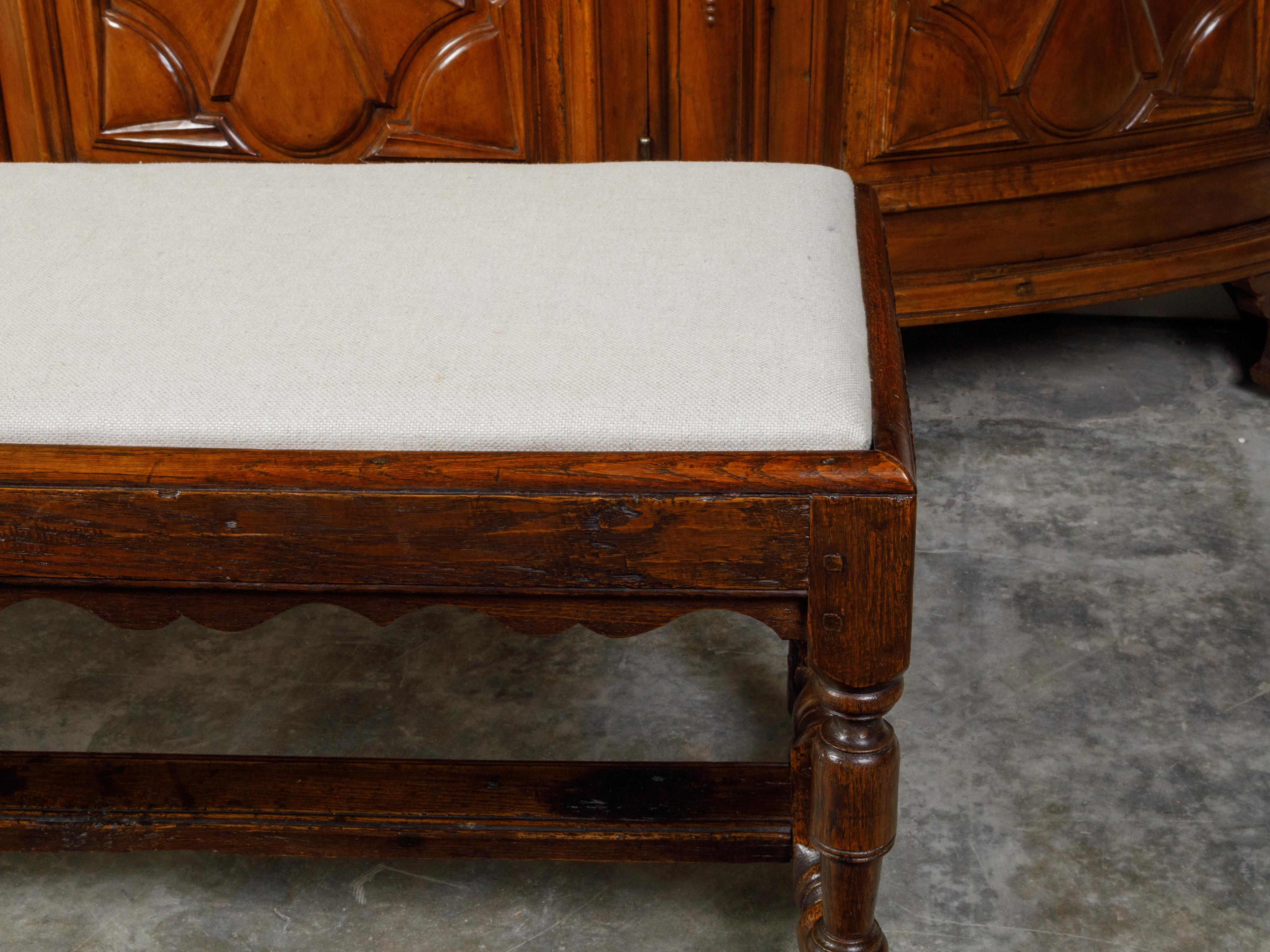 19th Century English 1840s Oak Bench with Turned Legs, H-Form Stretcher and Upholstery