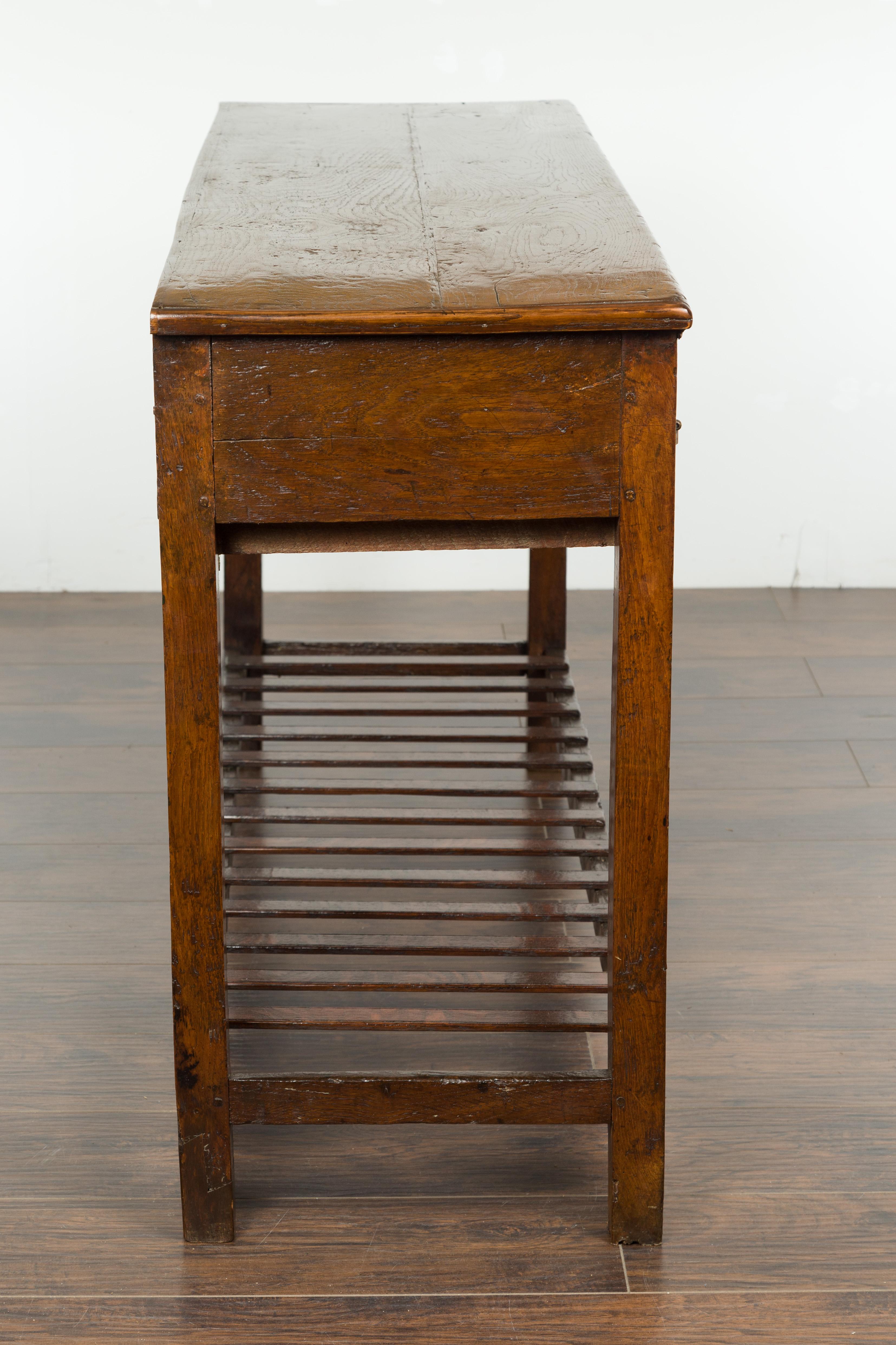 English 1840s Oak Dresser Base with Three Drawers and Lower Slatted Shelf 10