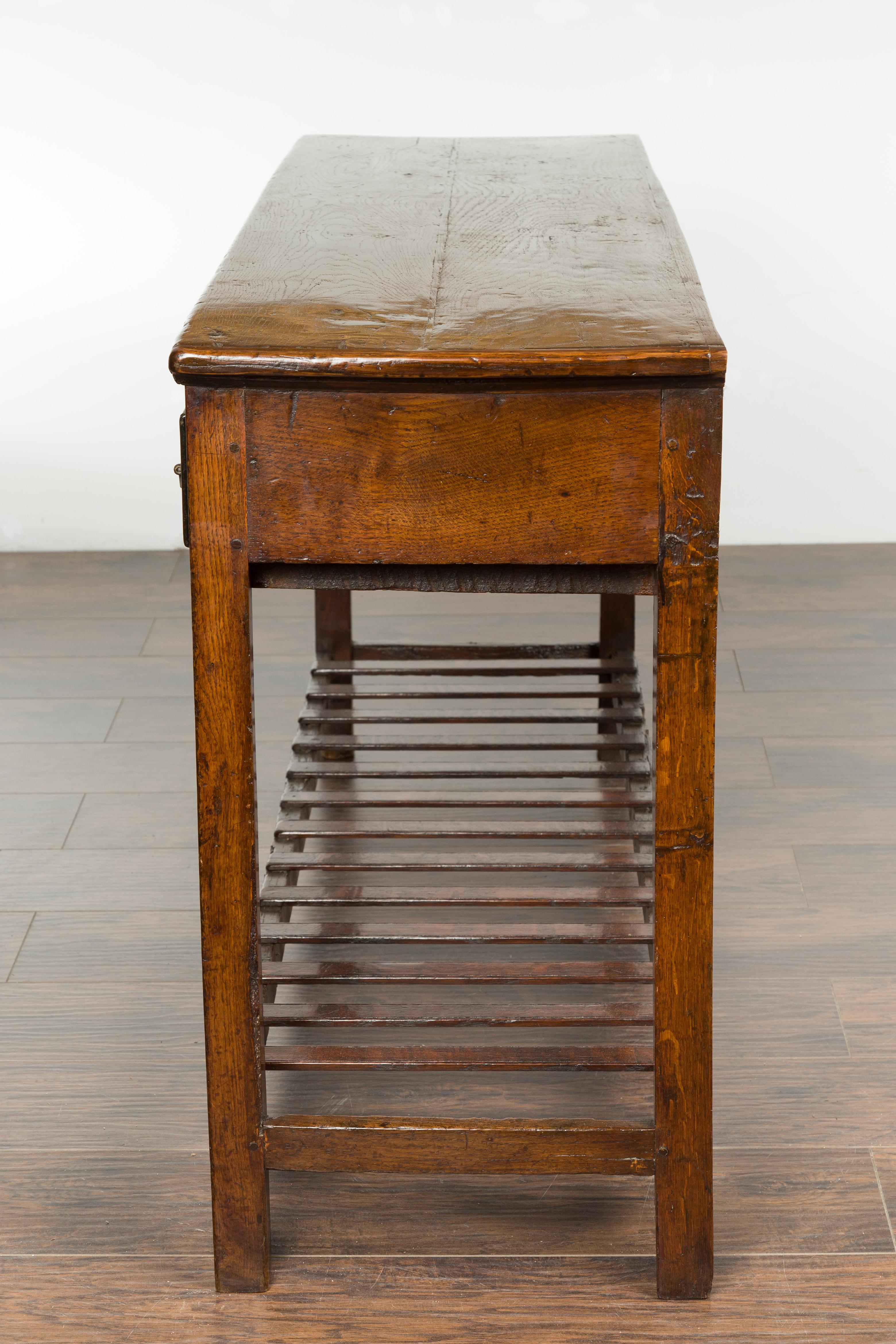 English 1840s Oak Dresser Base with Three Drawers and Lower Slatted Shelf 14