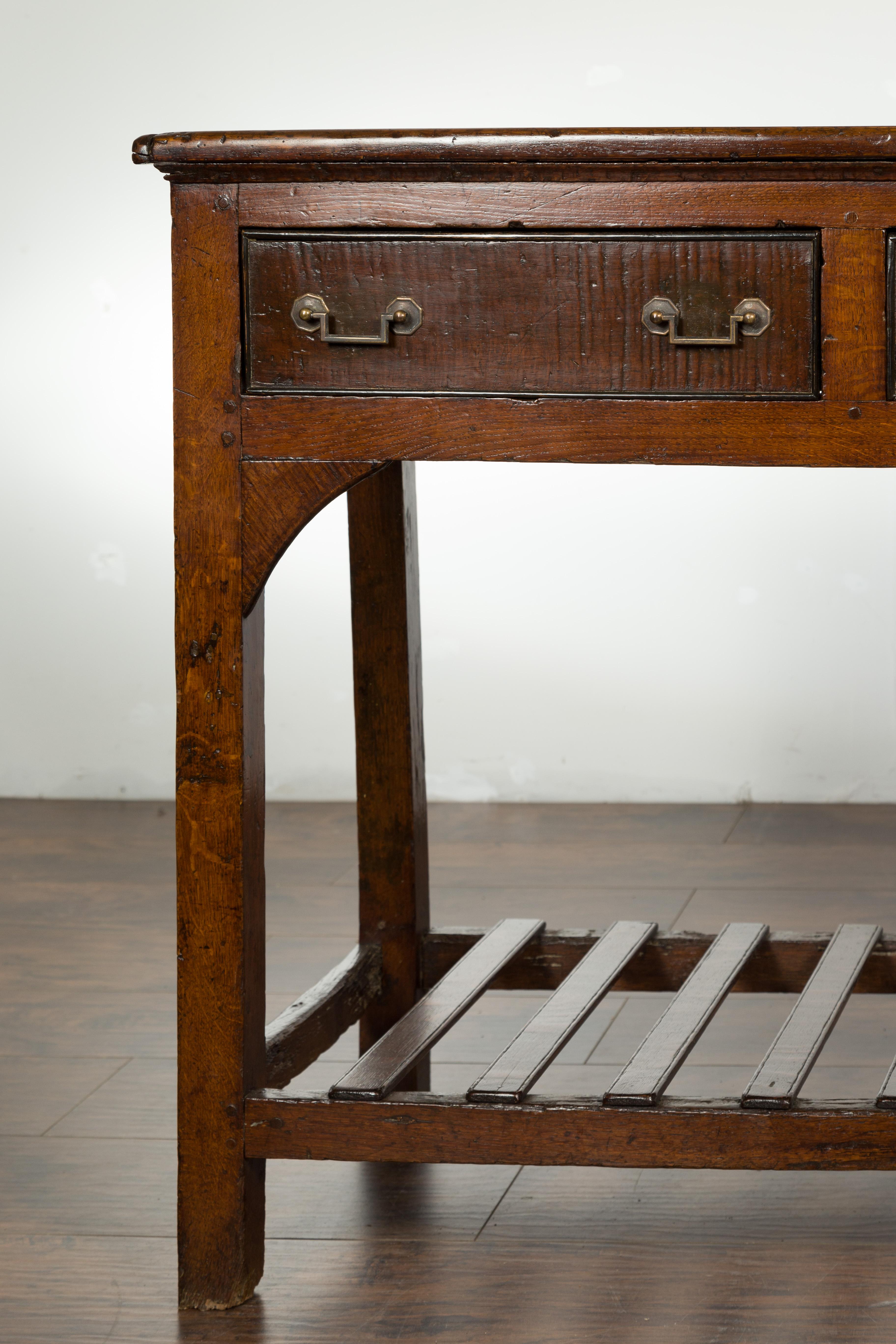 English 1840s Oak Dresser Base with Three Drawers and Lower Slatted Shelf 5