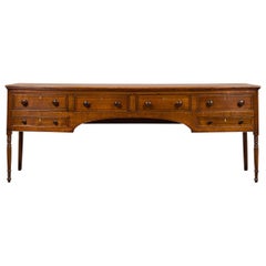 English 1850s Oak Dresser Base Server with Arched Accent and Six Drawers