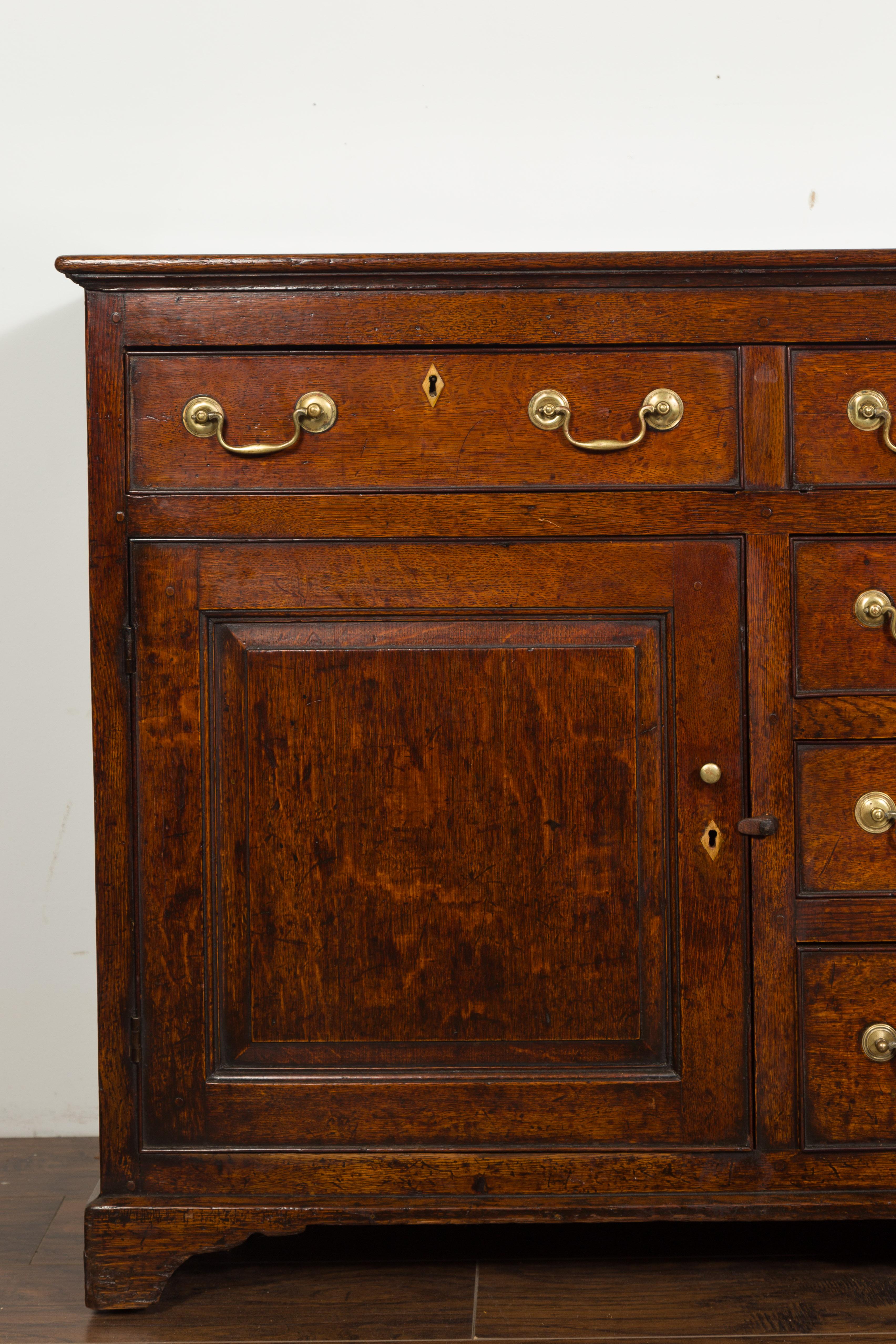 English 1850s Oak Dresser Base with Drawers, Doors, Brass Hardware, Bone Inlay 1