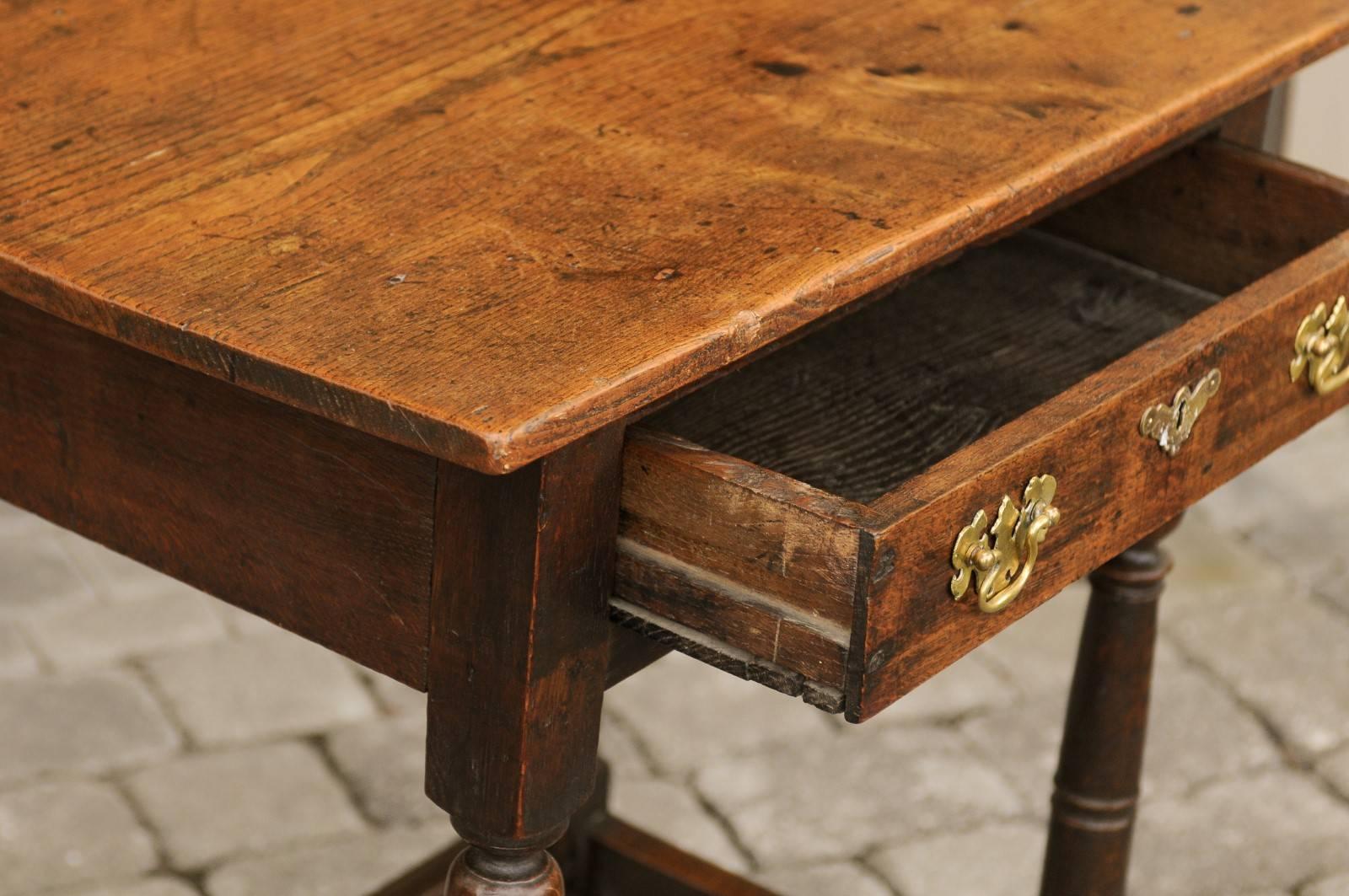English 1850s Oak Side Table with Drawer, Brass Hardware and Turned Legs 3