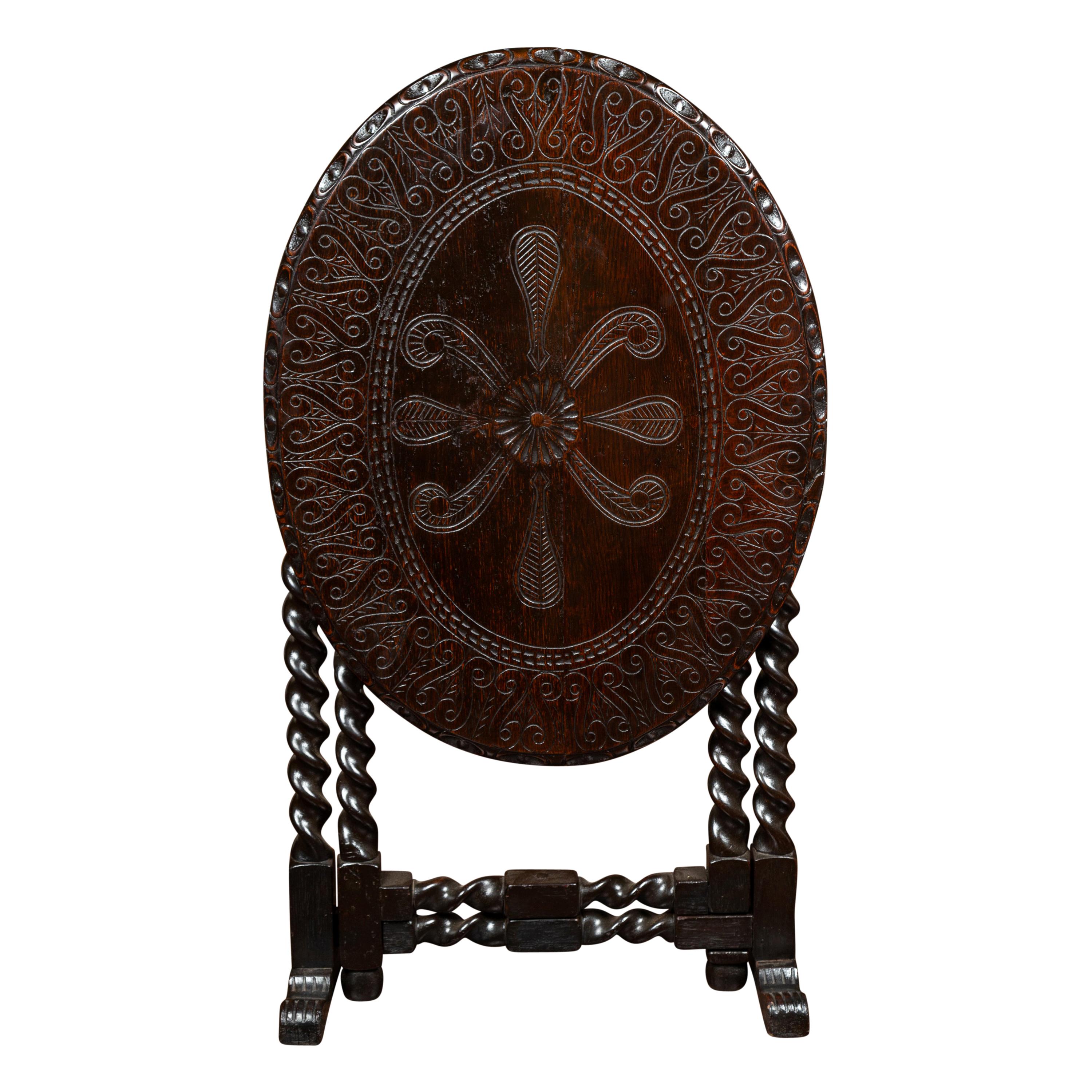 English 1850s Oak Gate Leg Oval Table with Carved Decor and Barley Twist Base