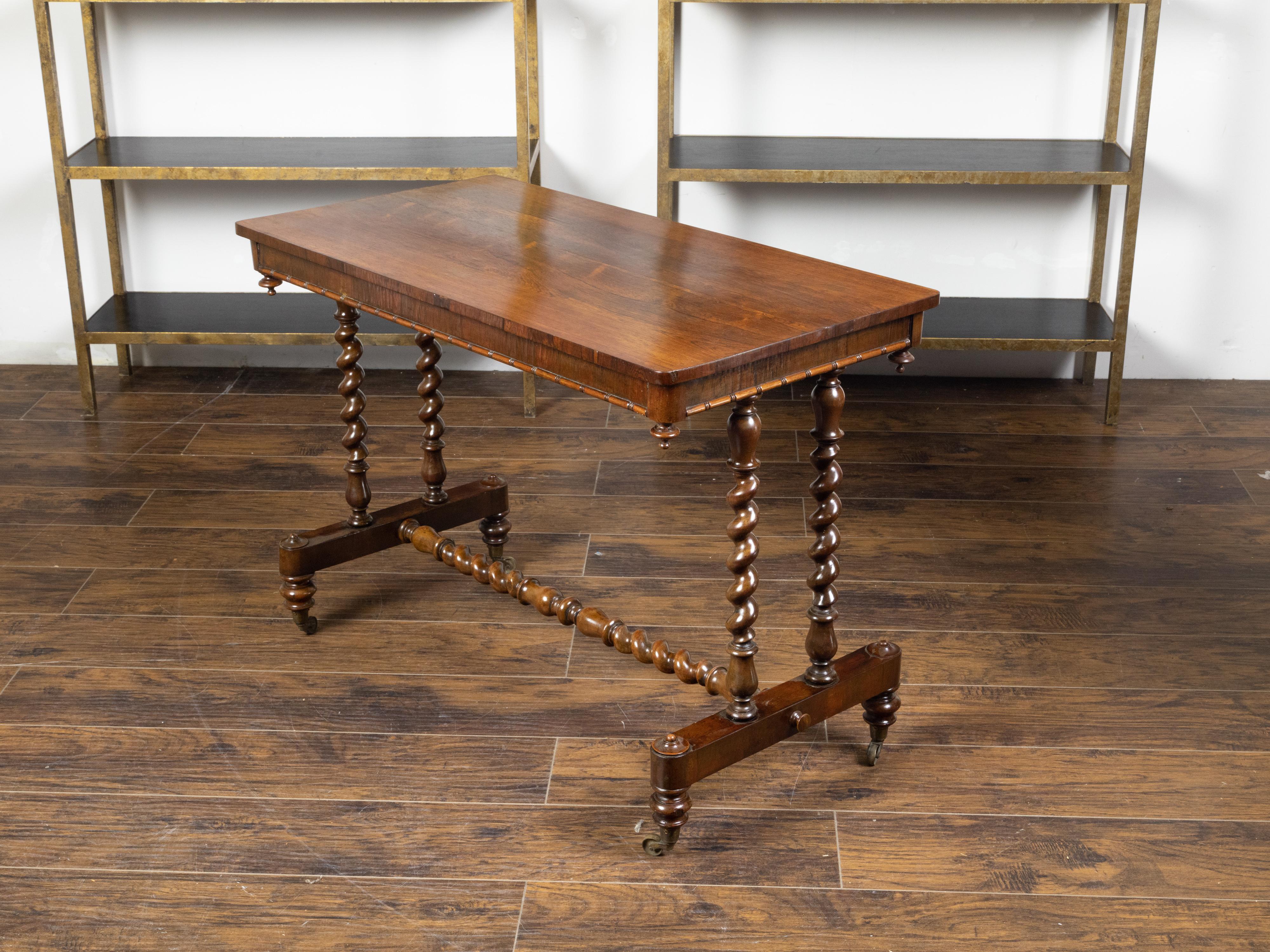 English 1860s Mahogany Table with Barley Twist Base and Petite Casters For Sale 8