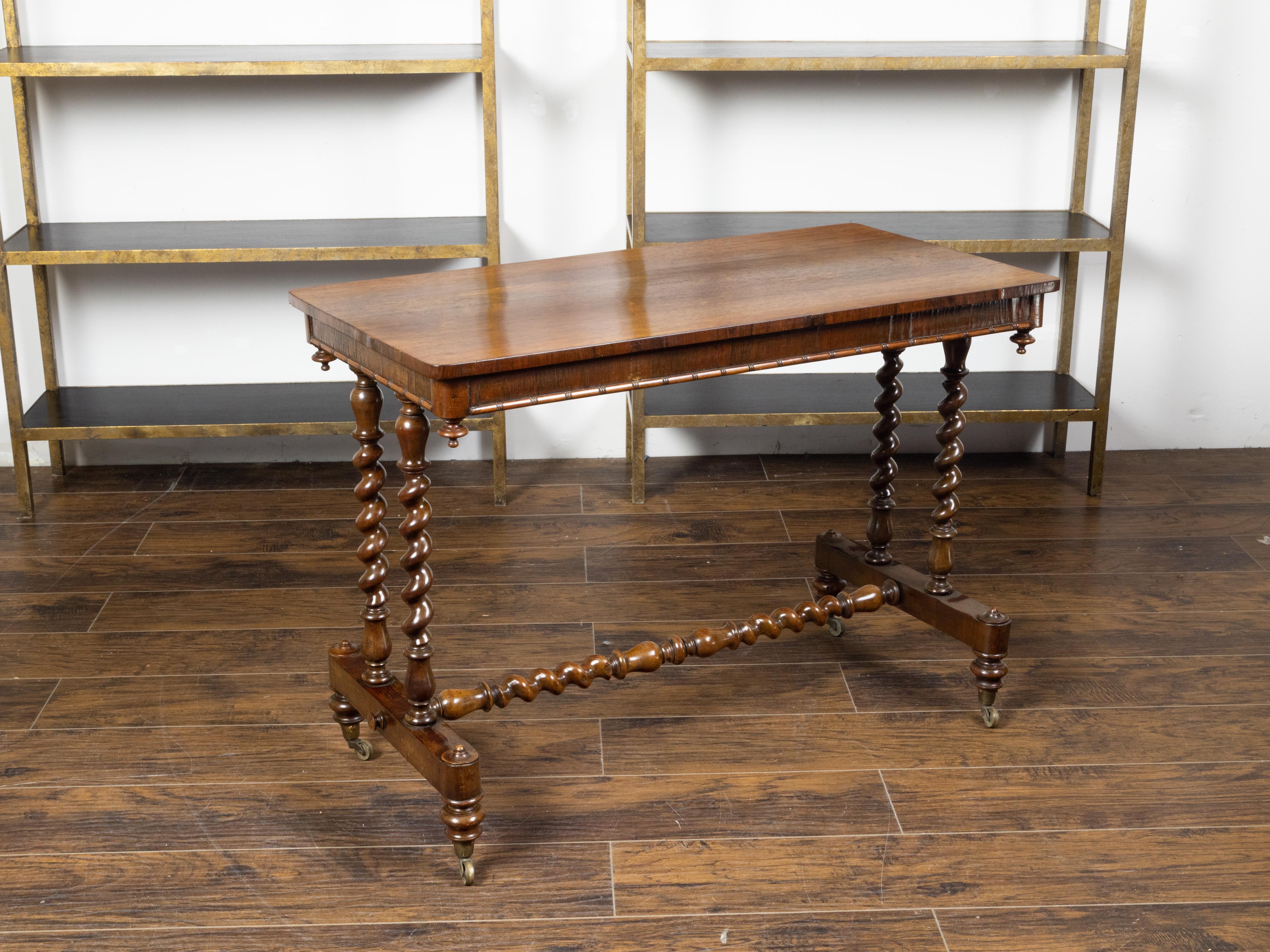 English 1860s Mahogany Table with Barley Twist Base and Petite Casters For Sale 3