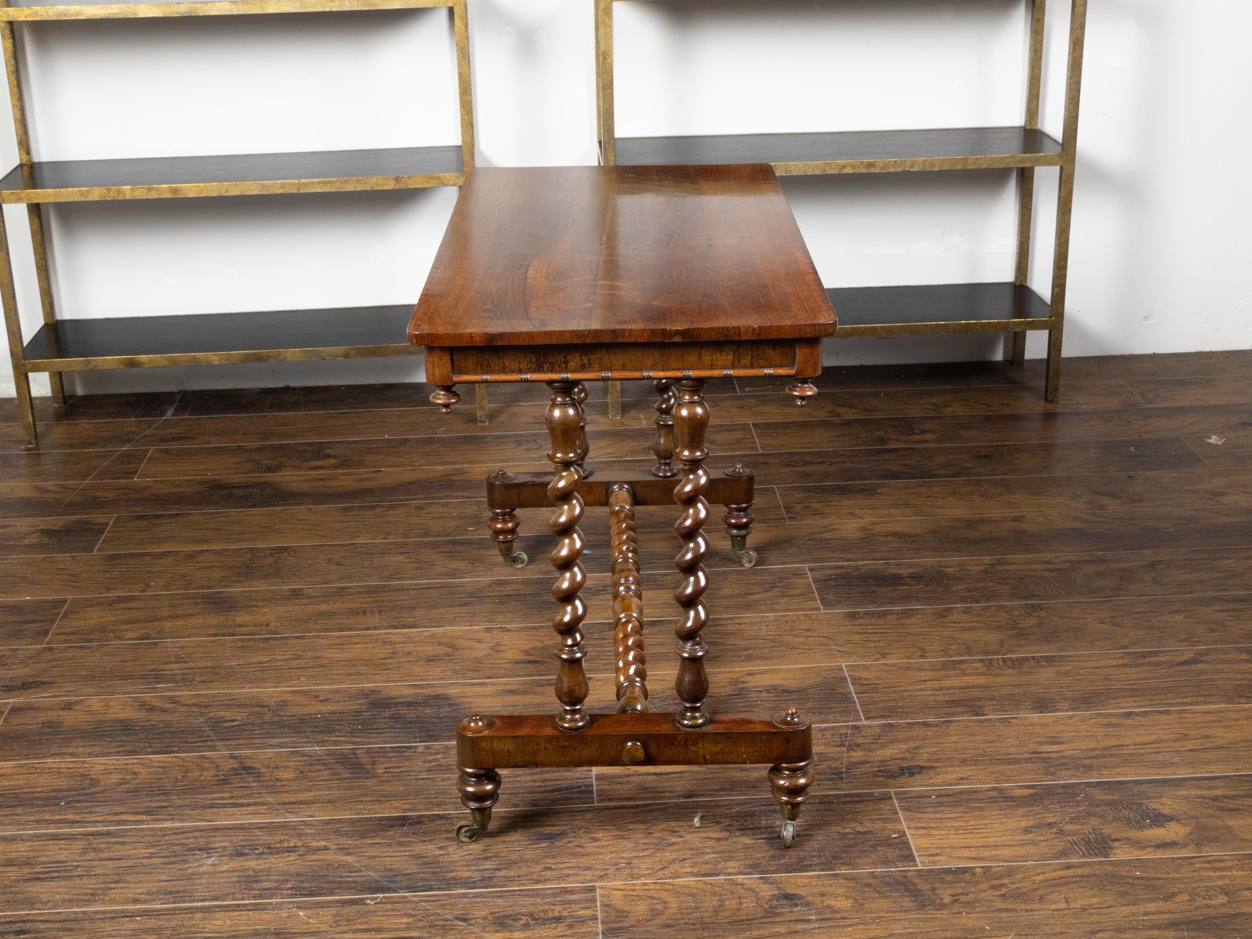 English 1860s Mahogany Table with Barley Twist Base and Petite Casters For Sale 4