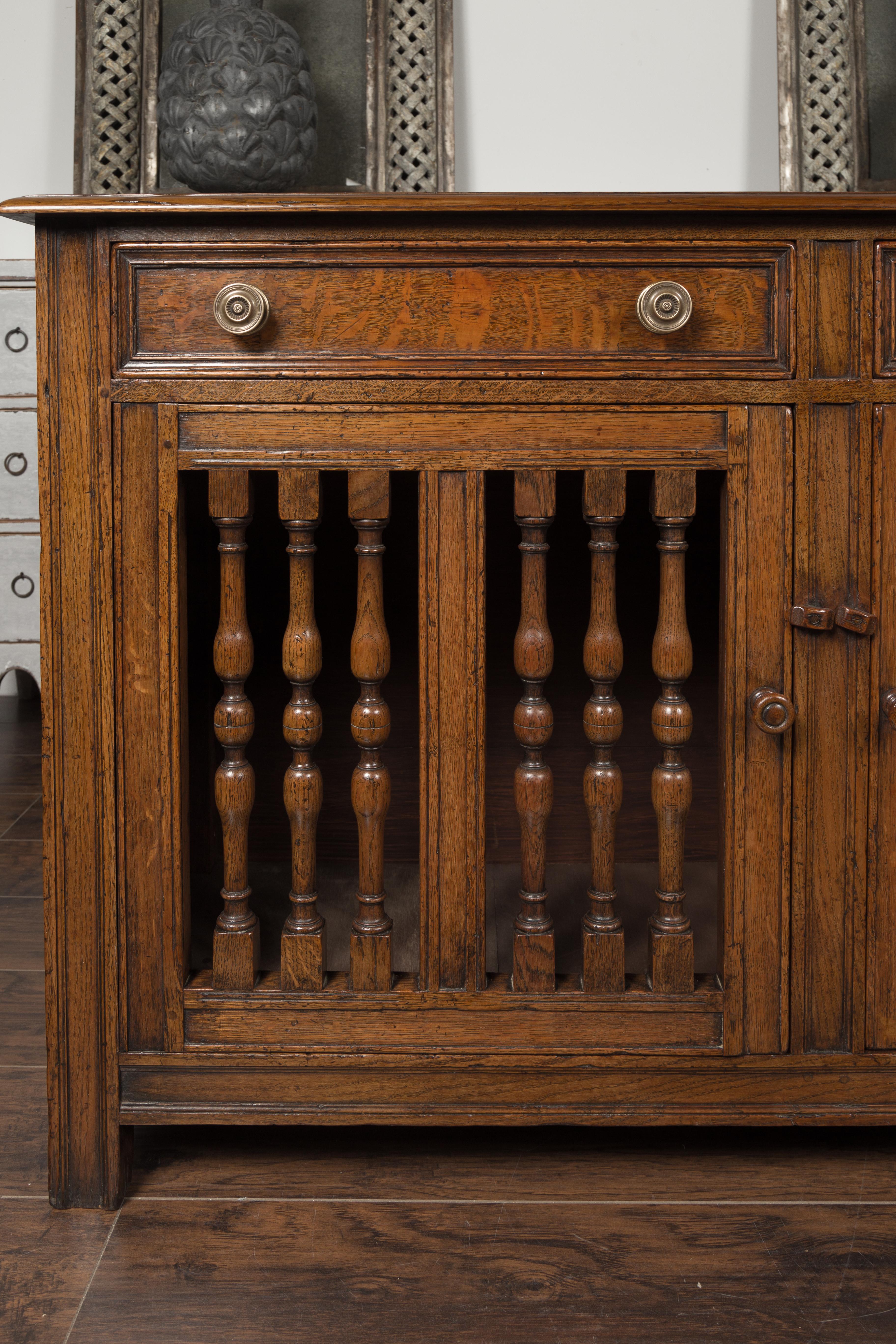 19th Century English 1860s Oak Buffet with Two Drawers, Two Doors and Baluster Motifs