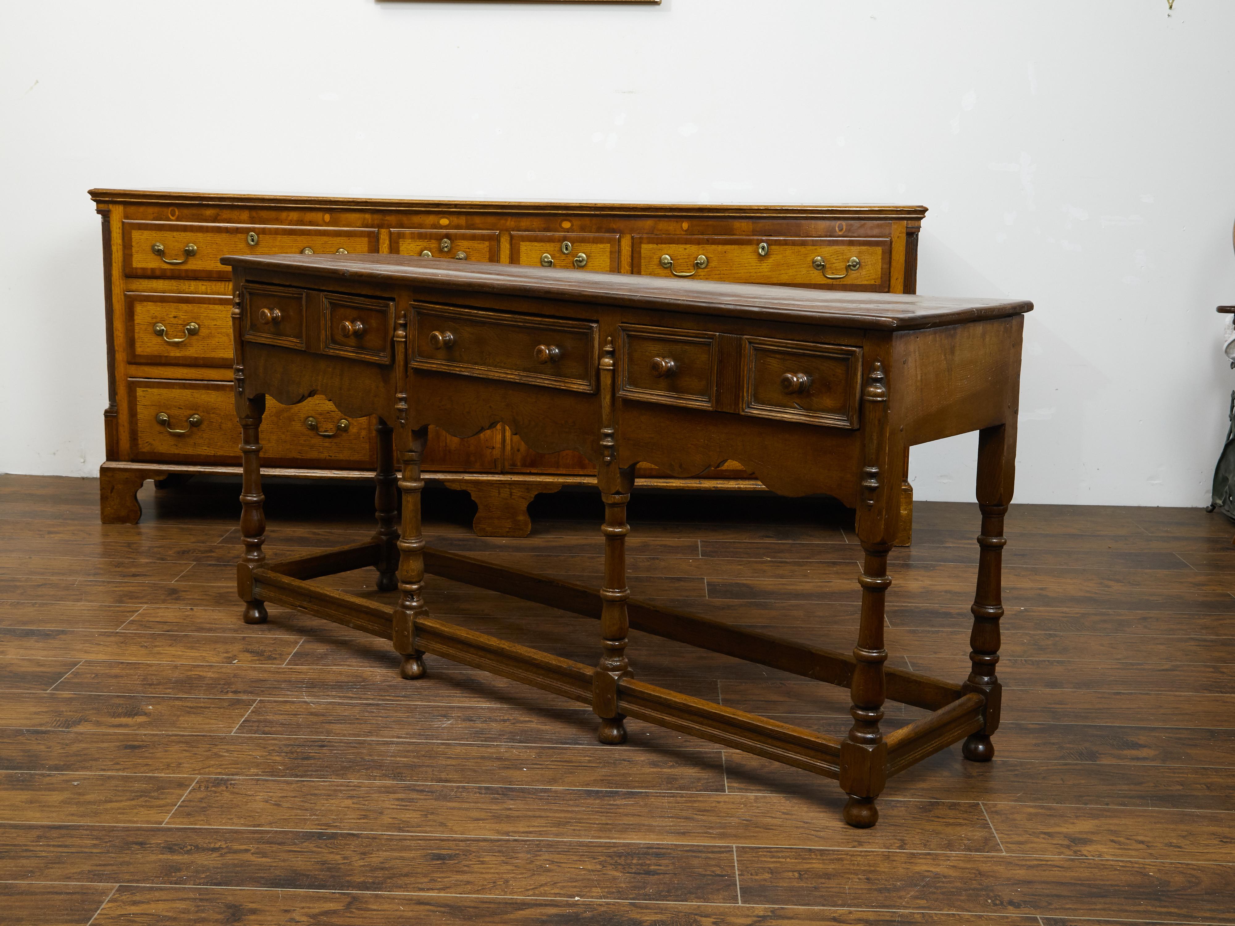 English 1860s Oak Dresser Base with Drawers, Scalloped Apron and Turned Legs In Good Condition For Sale In Atlanta, GA