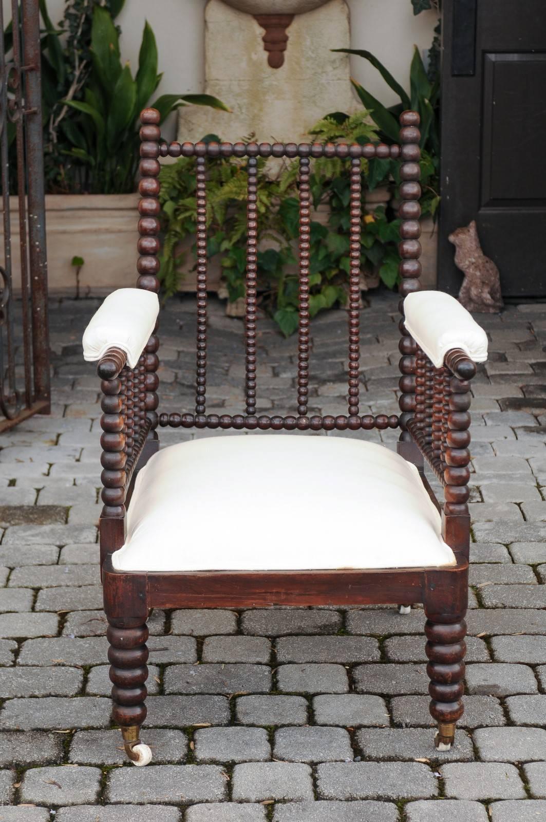 English 1870s Bobbin Chair with Slanted Back, Casters and Upholstered Seat 2