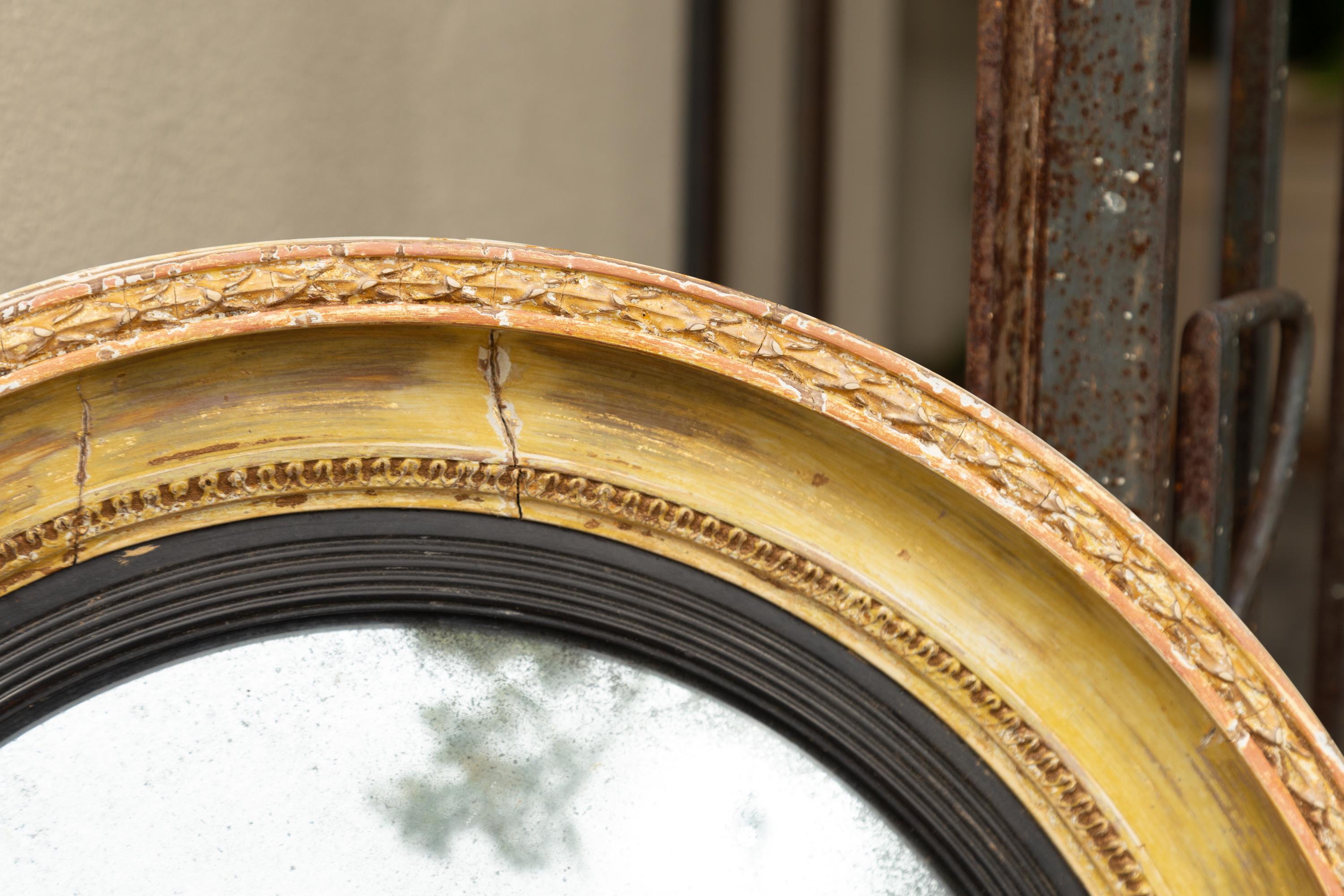 English 1870s Distressed Wood Convex Bullseye Mirror with Ebonized Accents In Good Condition In Atlanta, GA